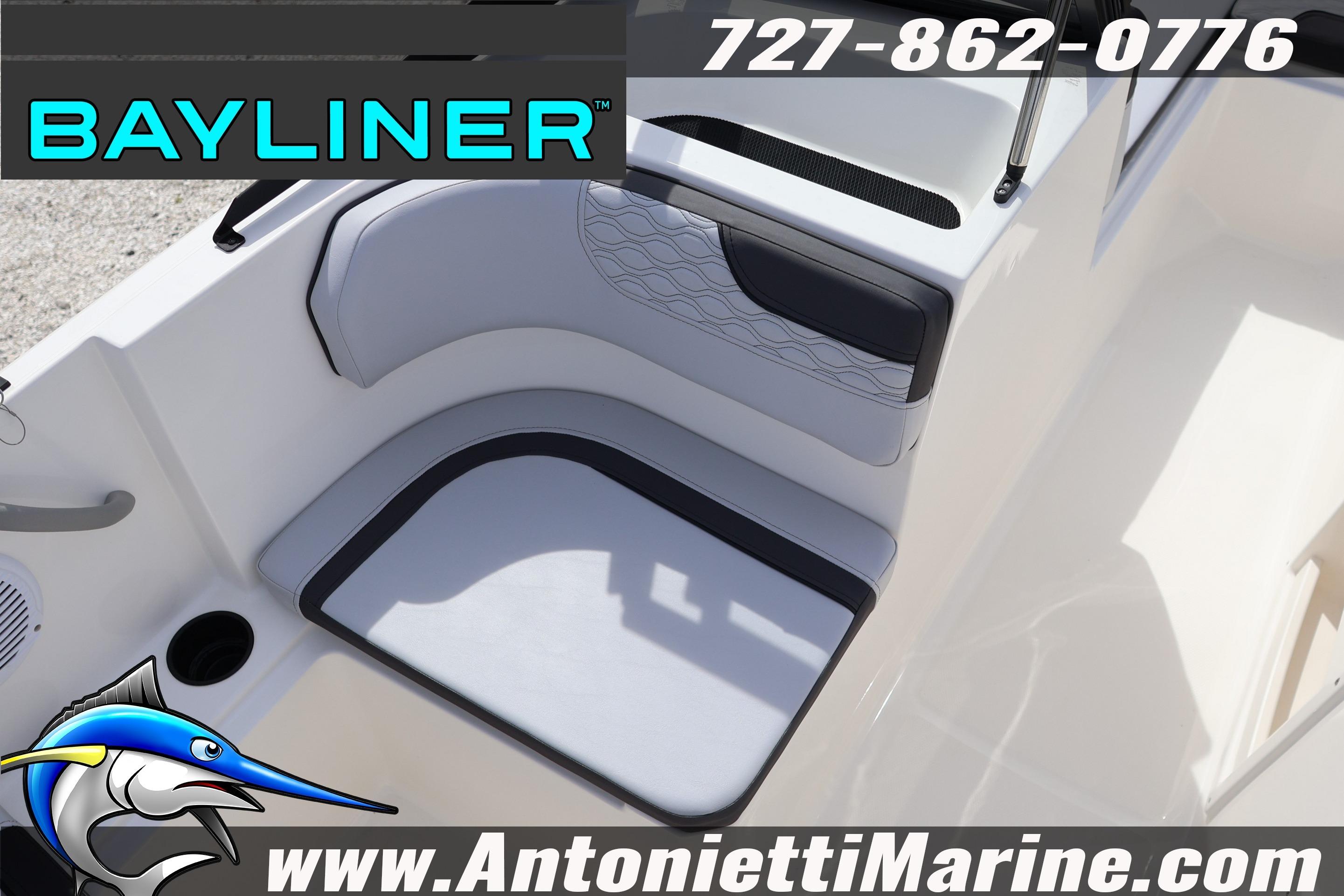 2026 Bayliner Element M17 boat interior with seating, cup holder, and branding details.