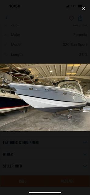 2006 Formula 330 Sun Sport boat in storage facility.
