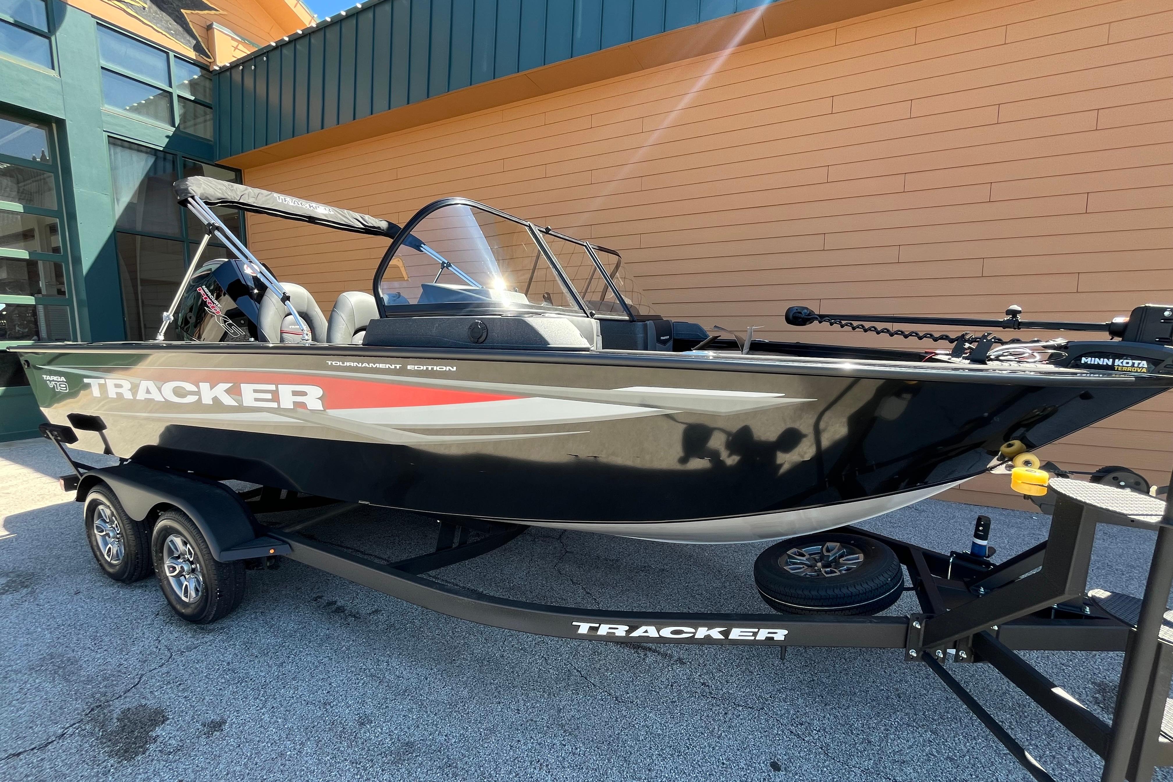 2026 Tracker Targa V-19 WT boat on trailer, black exterior, parked outdoors.