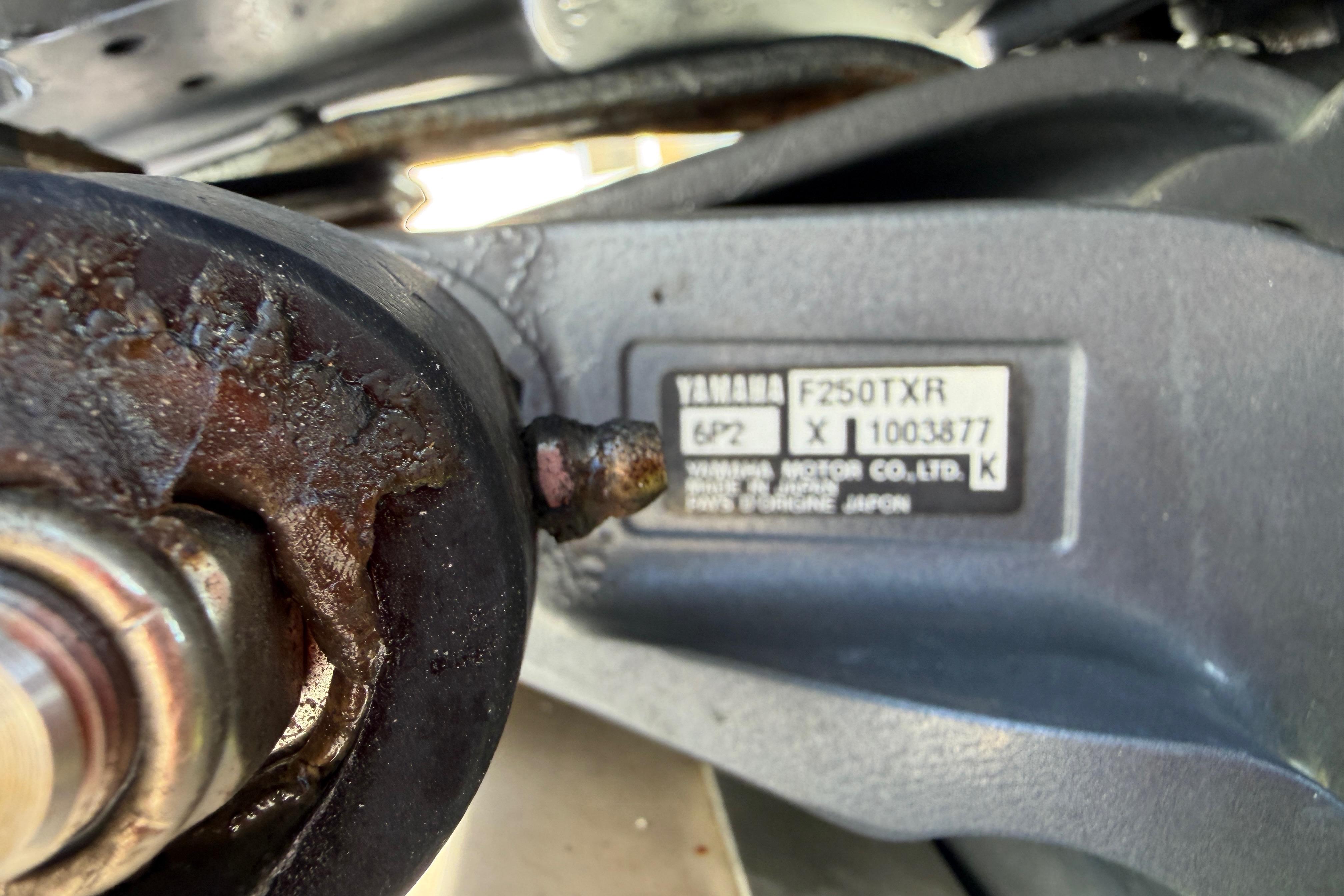 Close-up of Yamaha F250TXR engine part on 2006 Grady-White Sailfish 282 boat.