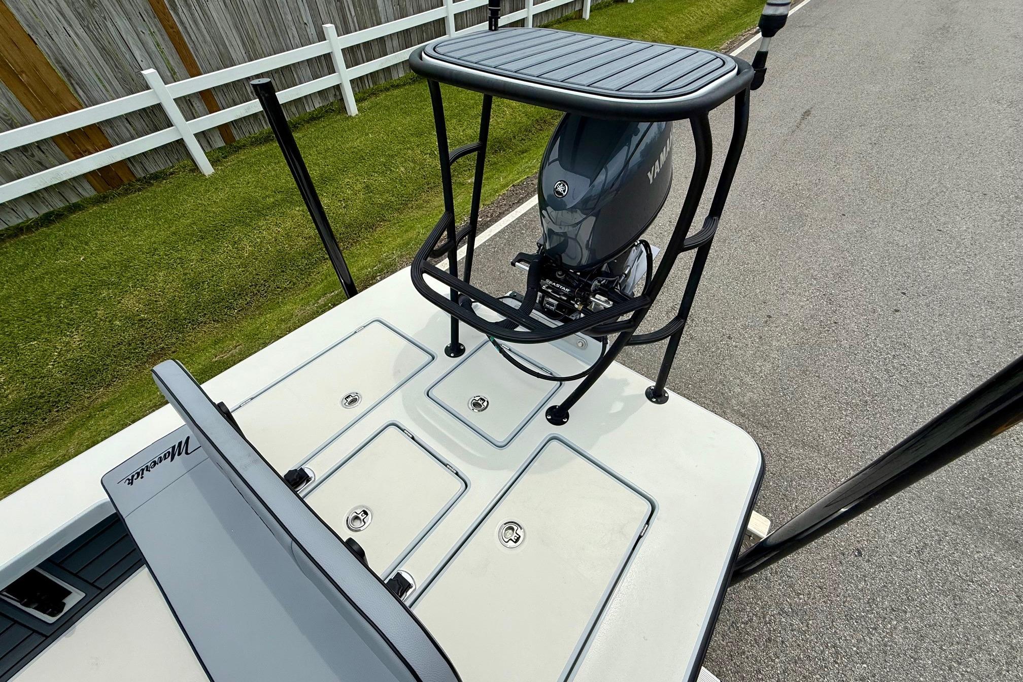 2026 Maverick 17 HPX-S boat with Yamaha engine, viewed from above on a road.