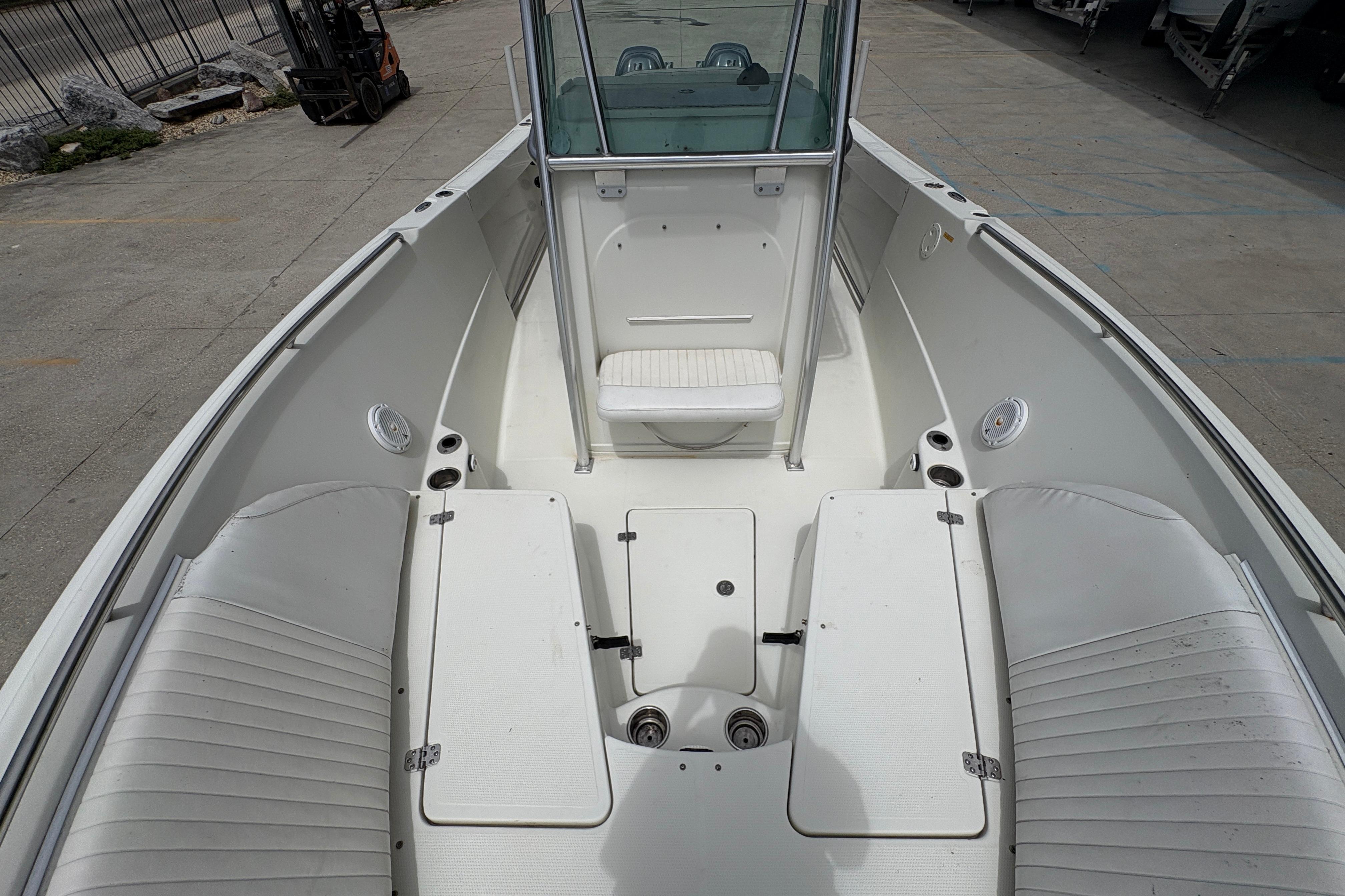 2006 Sail Faish 2360 boat interior with seating and storage compartments.