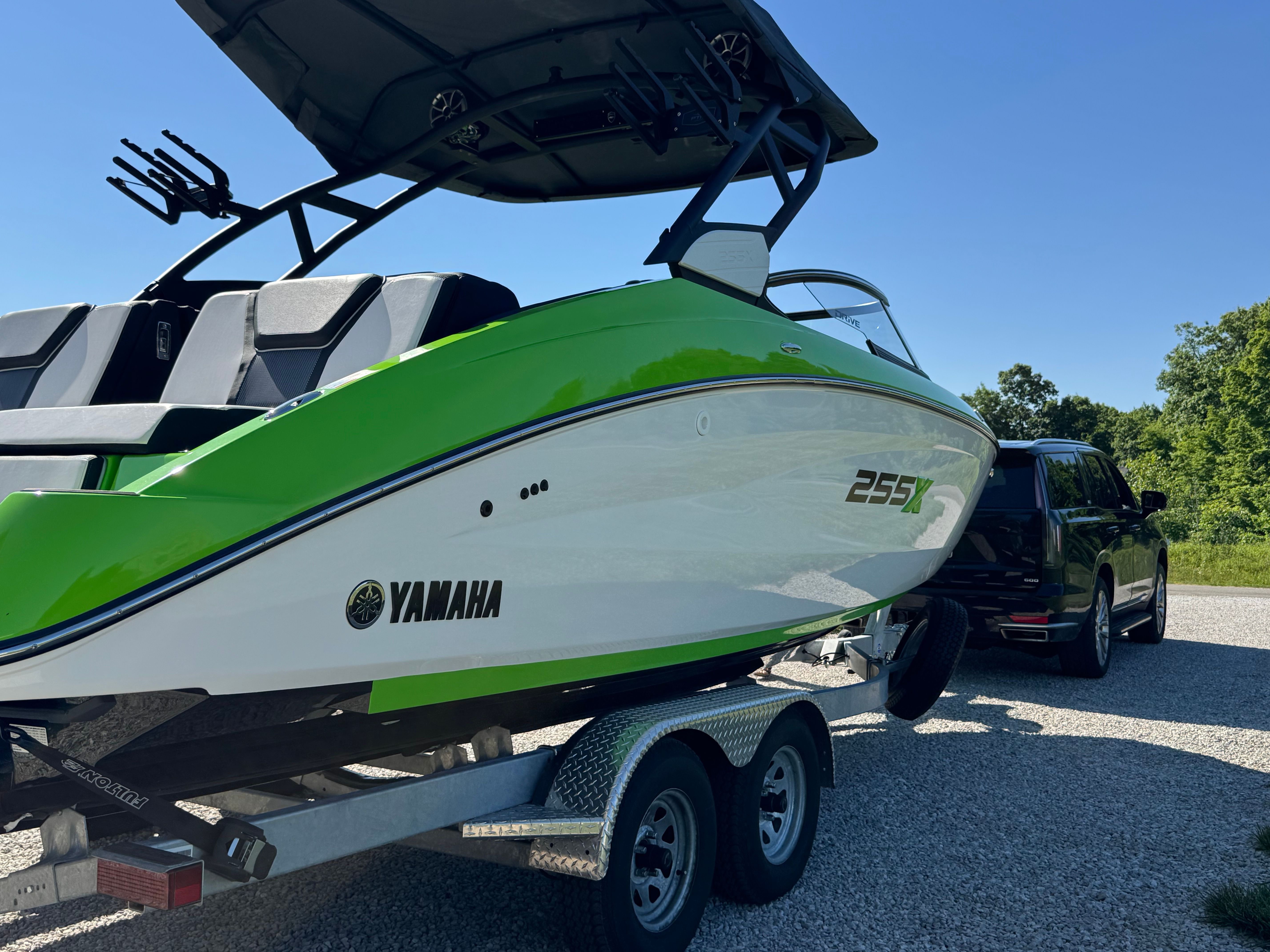Yamaha 255XD boat from 2022 on a trailer, ready for transport.