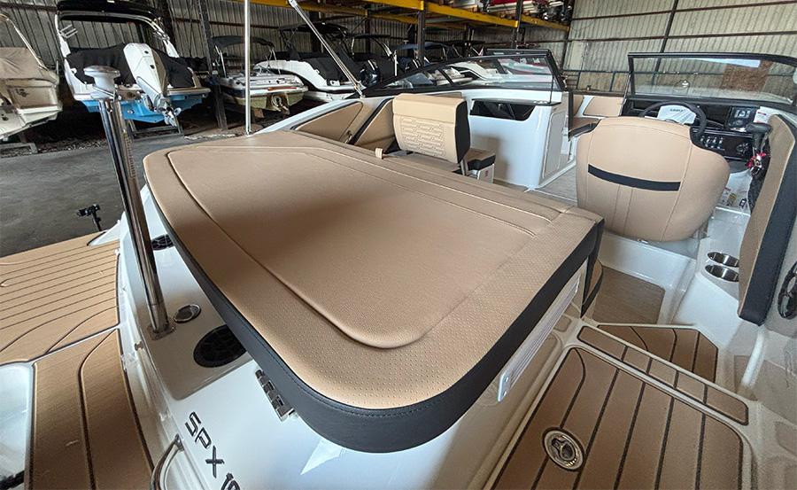 2025 Sea Ray SPX 190 Outboard boat interior with tan seating and modern design.