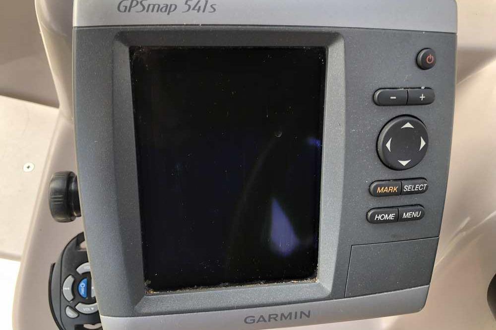 Garmin GPSmap 541s device on a 1999 Regal Commodore 2760 boat dashboard.