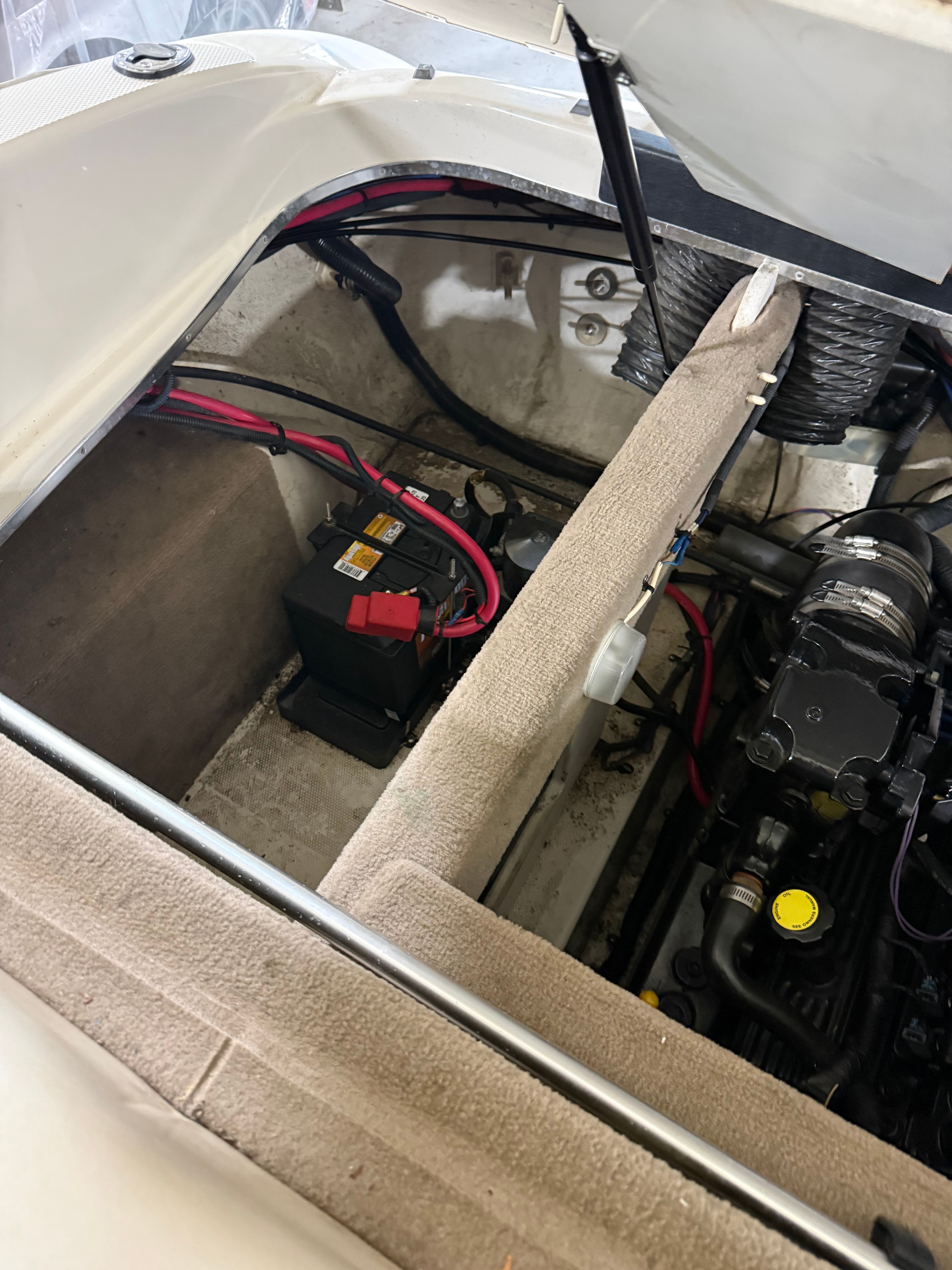 Engine compartment of a 2003 Sea Ray 240 SIGNATURE boat.