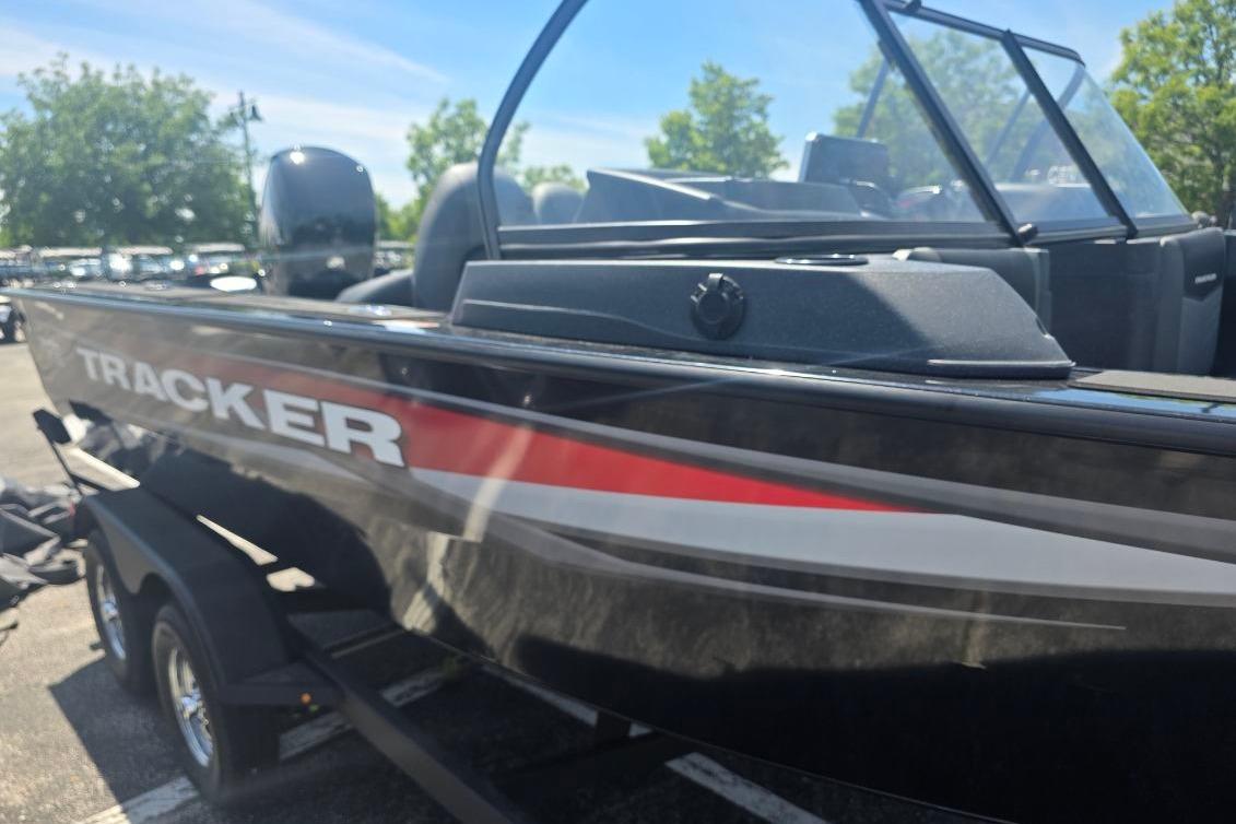 2026 Tracker Targa V-18 Combo boat with sleek design, parked outdoors.