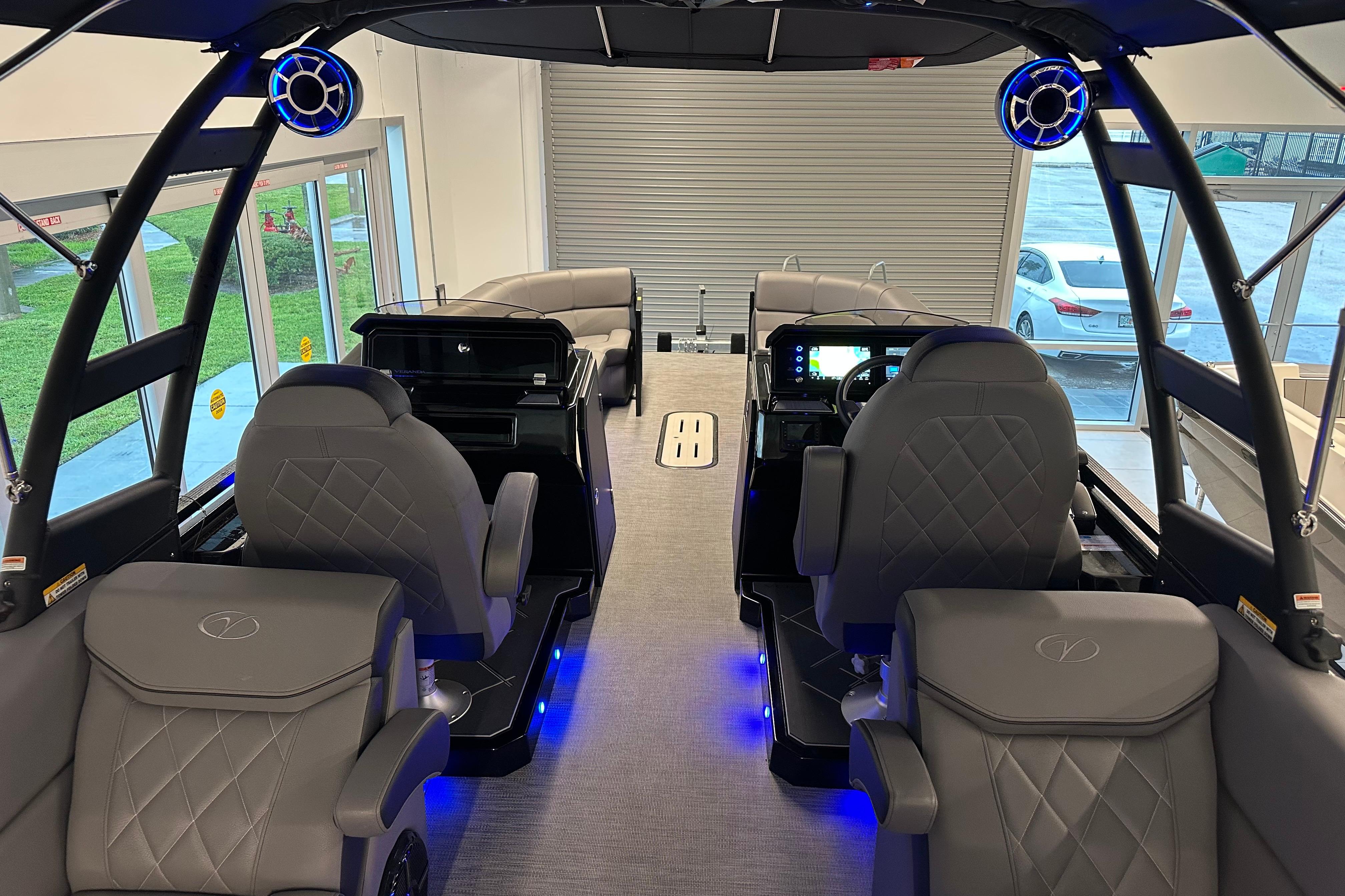 Interior of 2025 Veranda VX 27 DCRC boat with luxurious seating and modern controls.