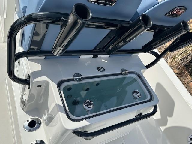 2025 Ranger 2360 Bay boat with rod holders and livewell.