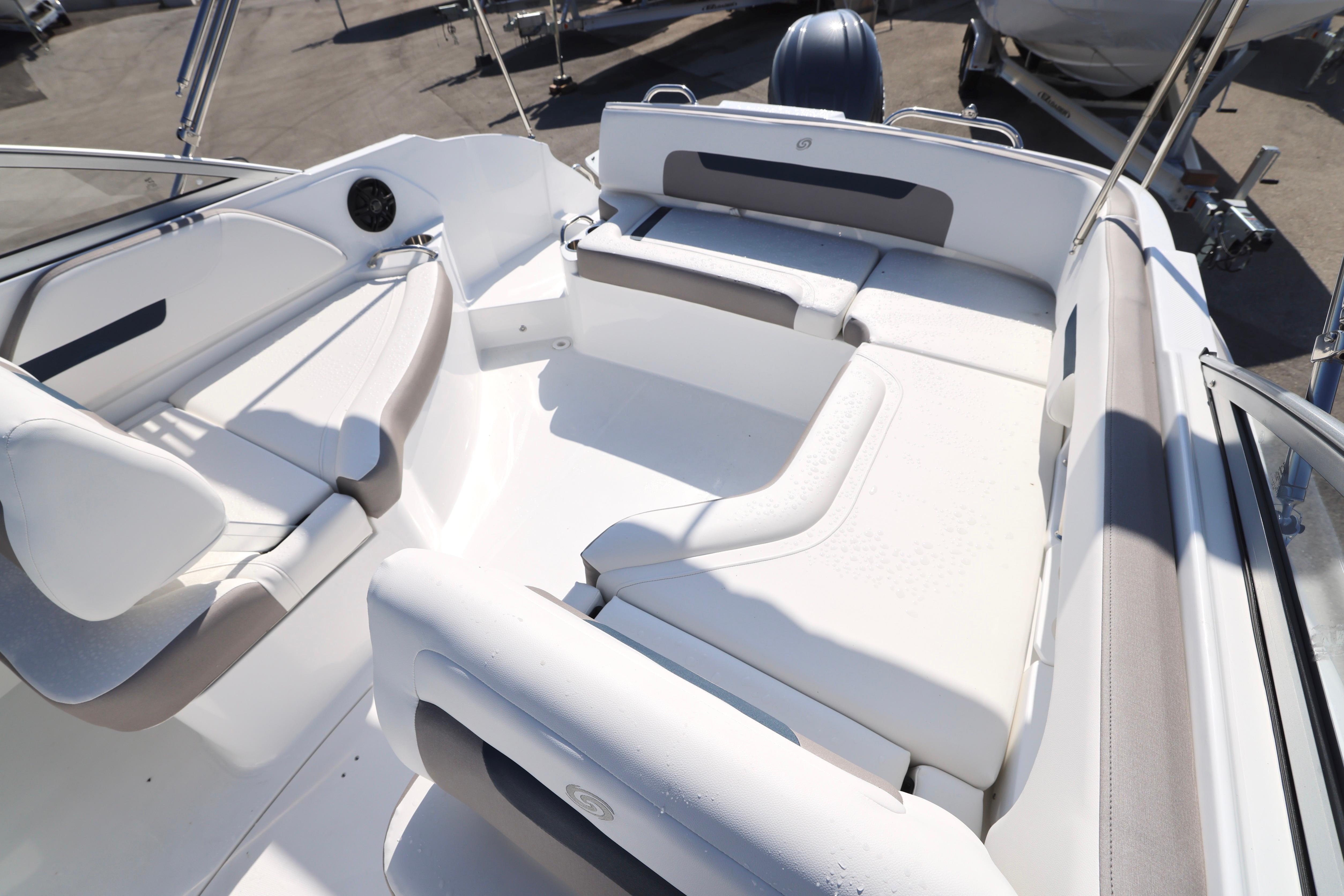 2026 Hurricane SunDeck 235 OB boat interior with spacious seating and modern design.