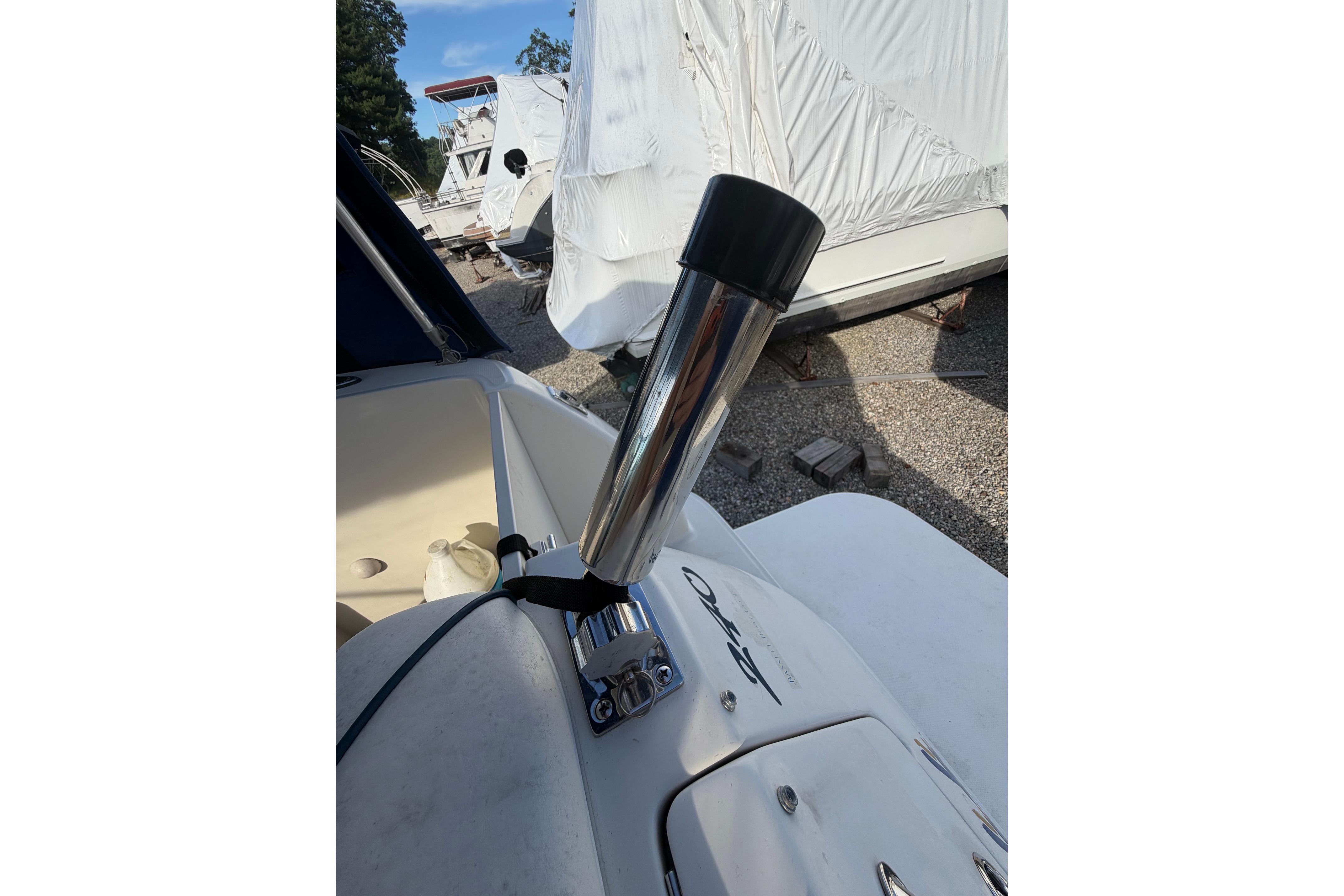 2000 Sea Ray 240 Sundancer boat detail with chrome exhaust pipe.