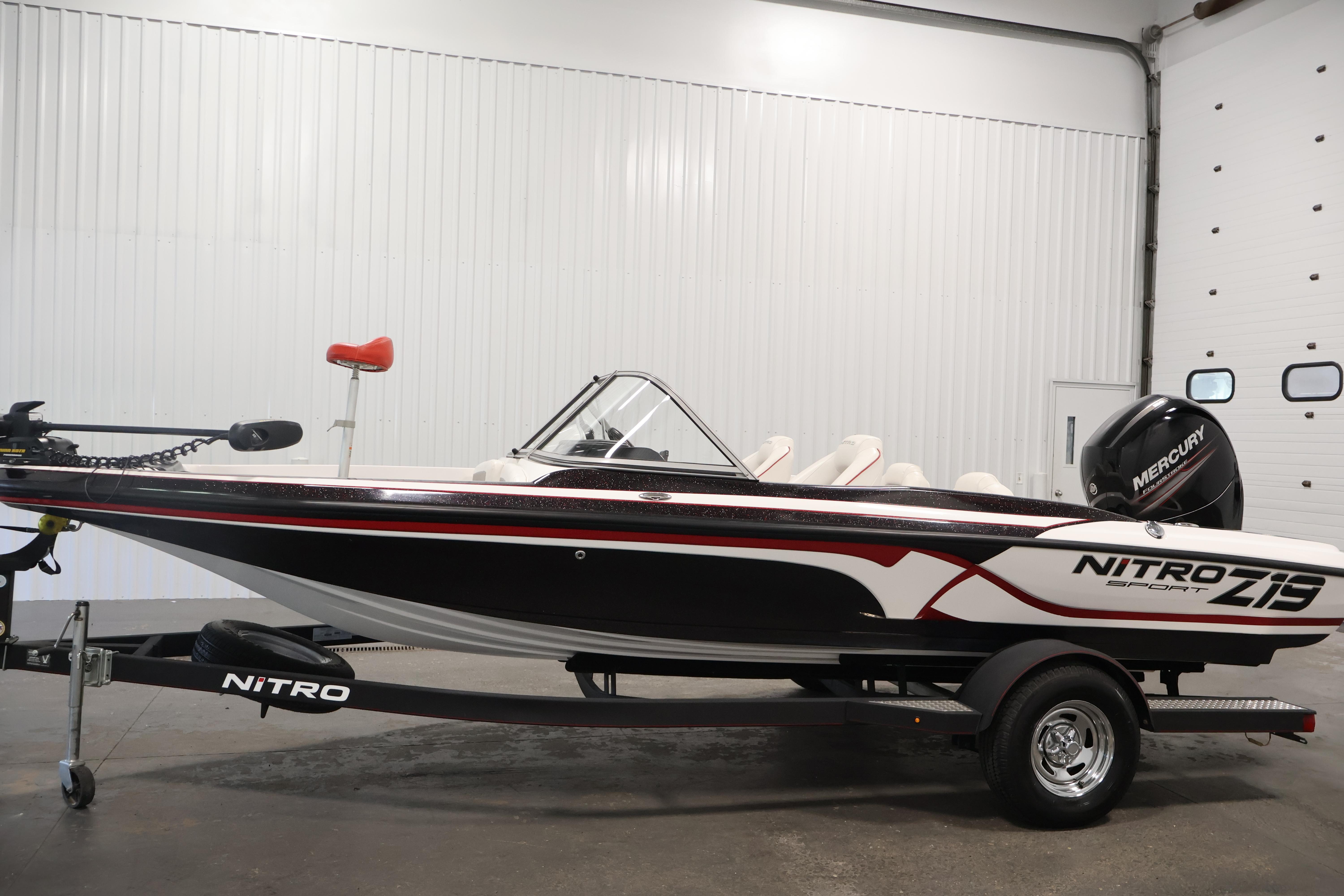 2019 Nitro Z19 Sport boat with Mercury engine in a showroom.