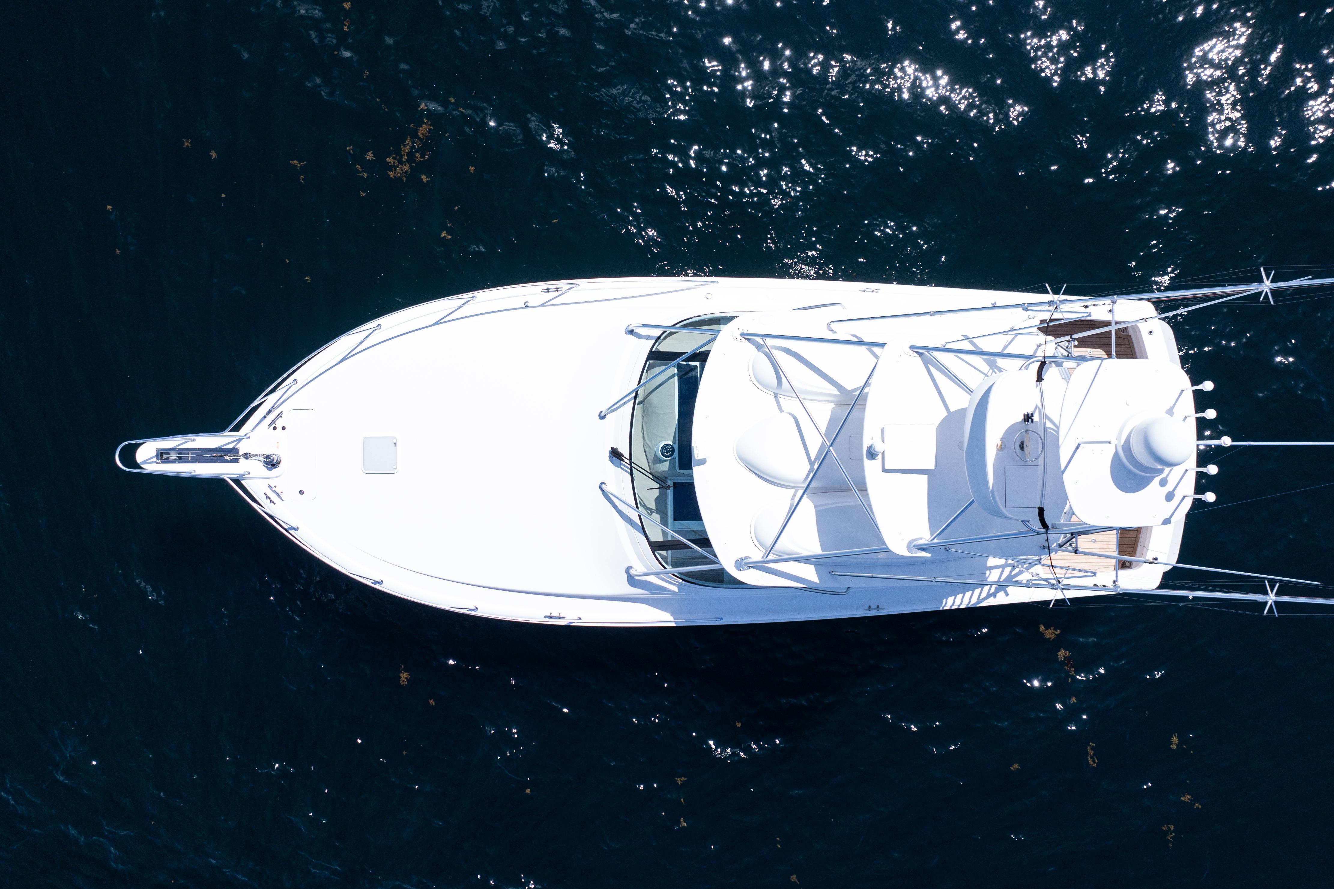 Overhead view of 2021 Viking 44 Open yacht on dark blue water.