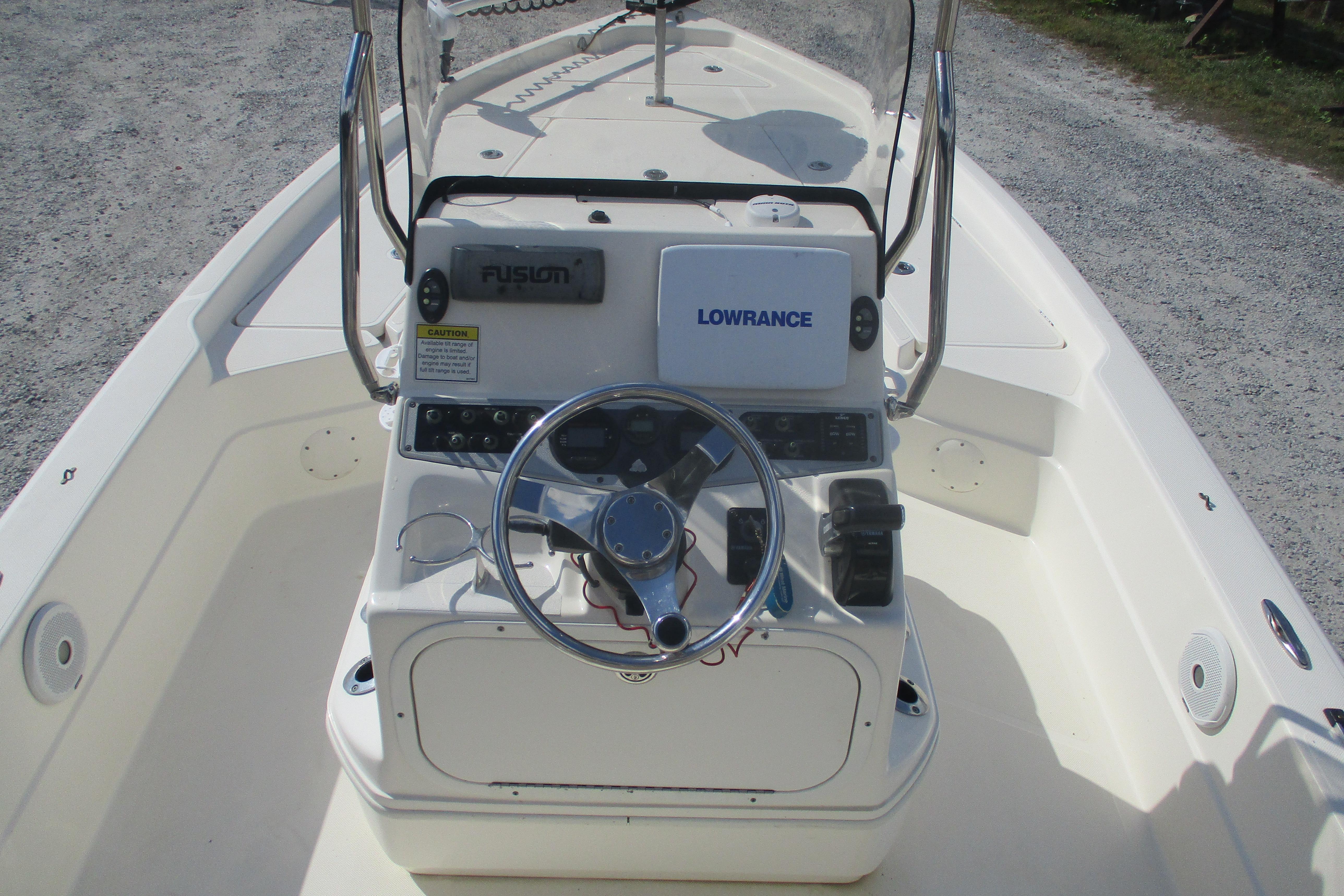 2014 Skeeter SX240 boat console with steering wheel and navigation equipment.