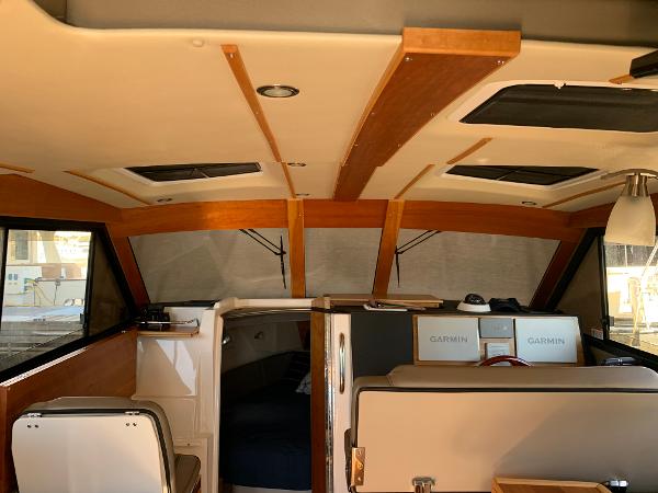 Interior of 2021 Cutwater C-32 CB boat with Garmin navigation systems.
