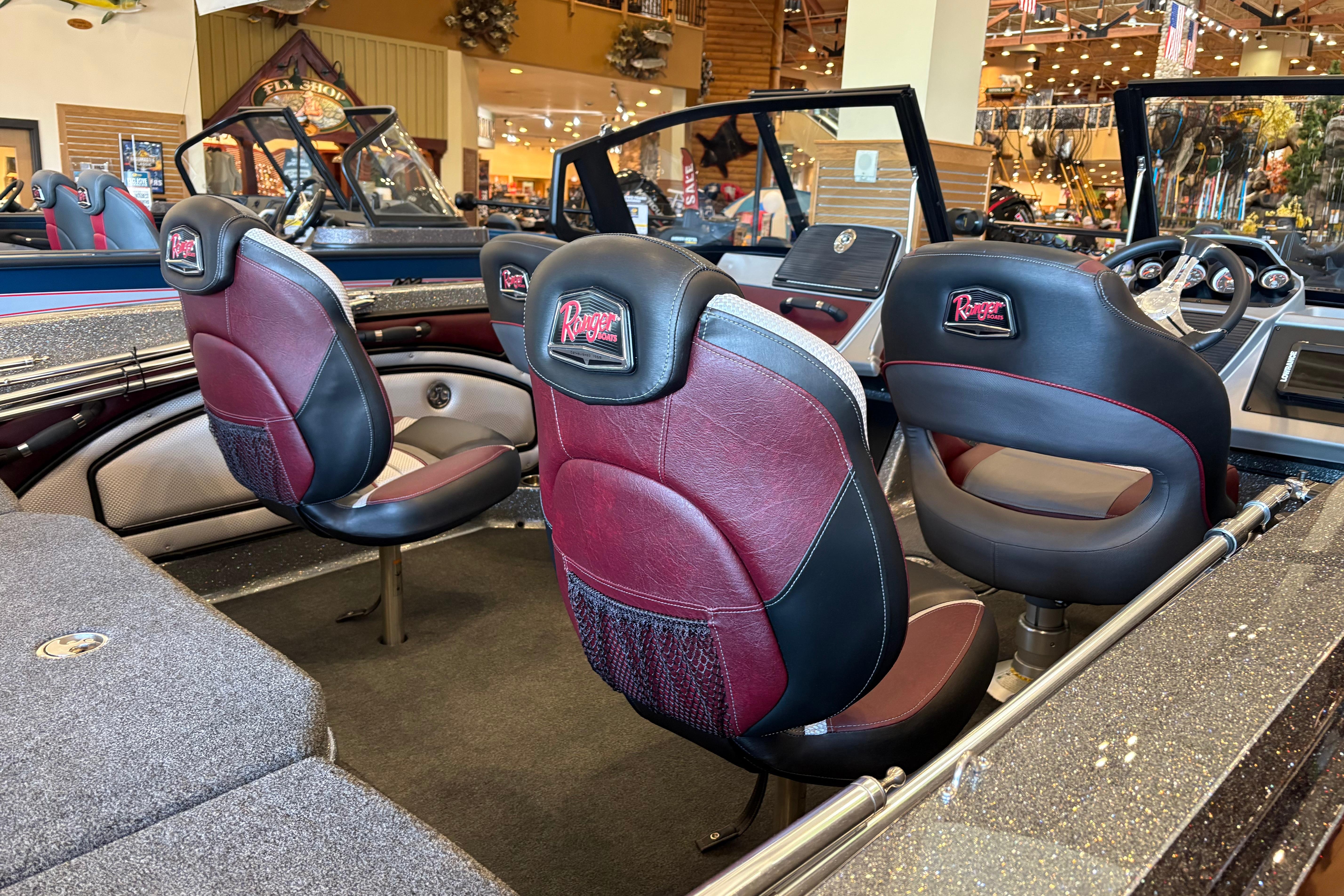 2026 Ranger 1850MS boat interior with stylish maroon and black seating.