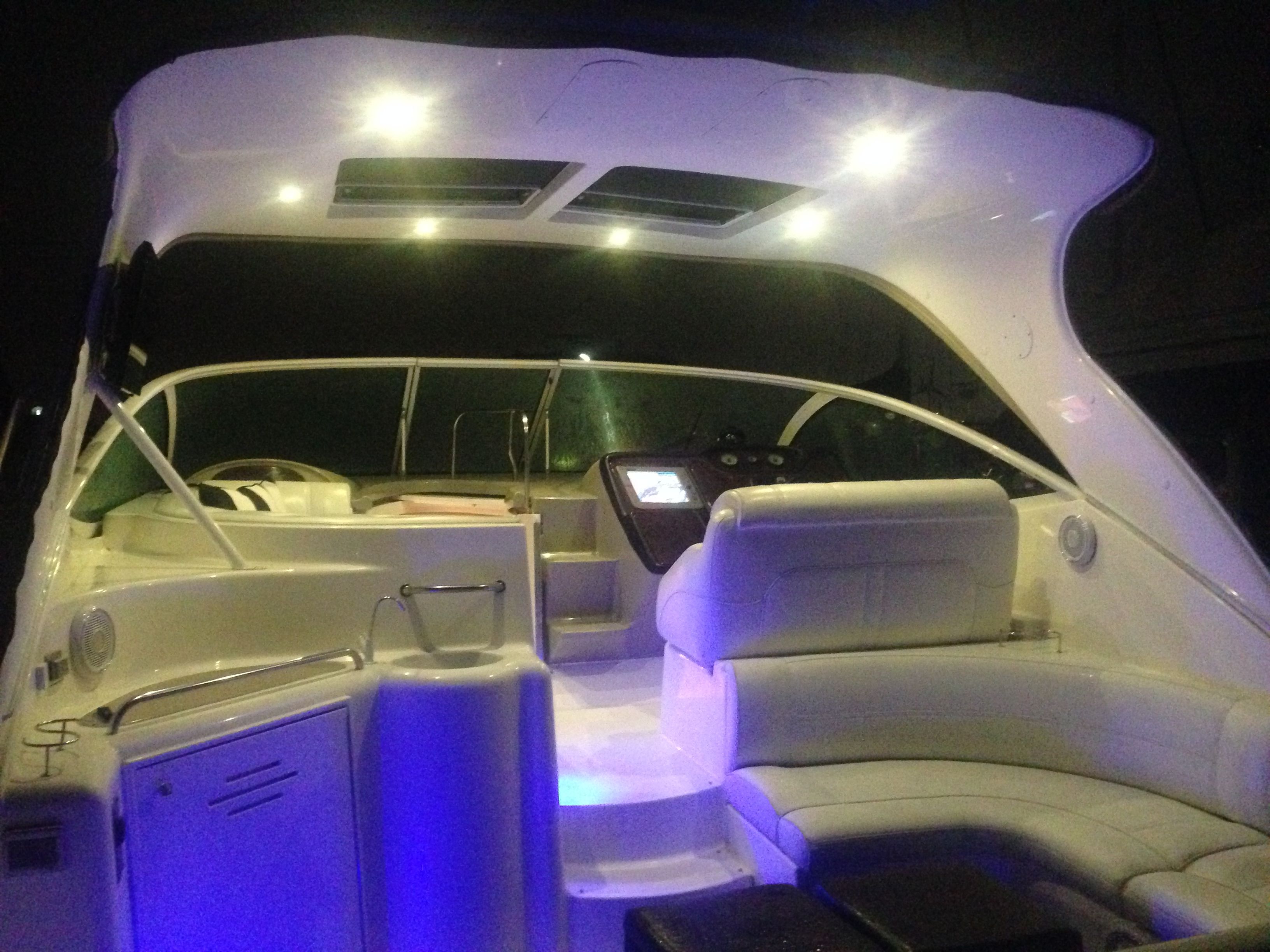 Interior of a 2004 Cruisers Yachts 3970 with night lighting.