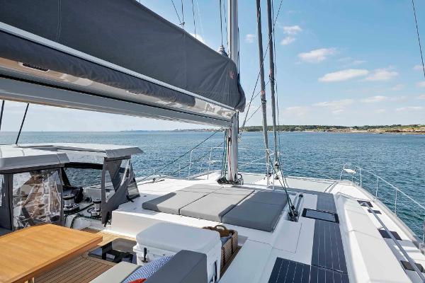 Luxury Privilege Signature 580 yacht deck, 2025 model, sailing on a sunny day.