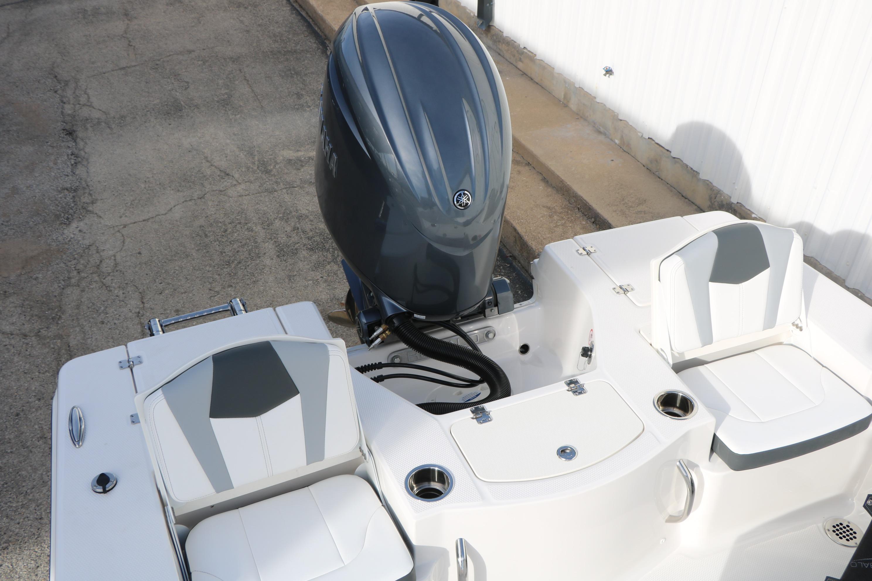 2026 Robalo 206 Cayman boat with Yamaha outboard motor and seating area.