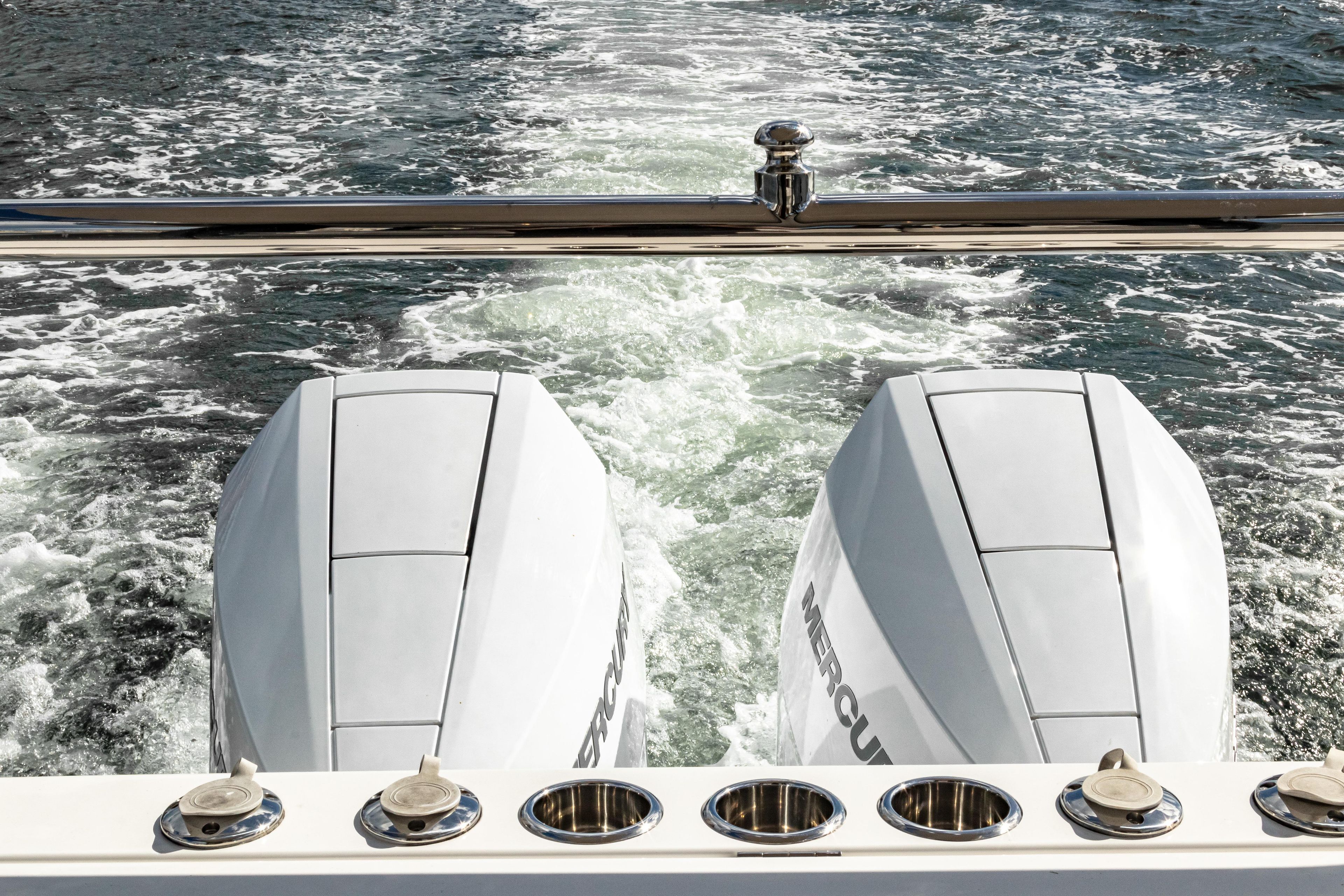 Aiata Wayfinder 38 Cabin 2026 with twin outboard motors on water.
