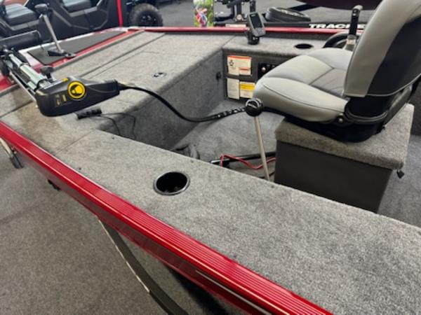 2025 Tracker Panfish 17 boat interior with gray seating and red trim.