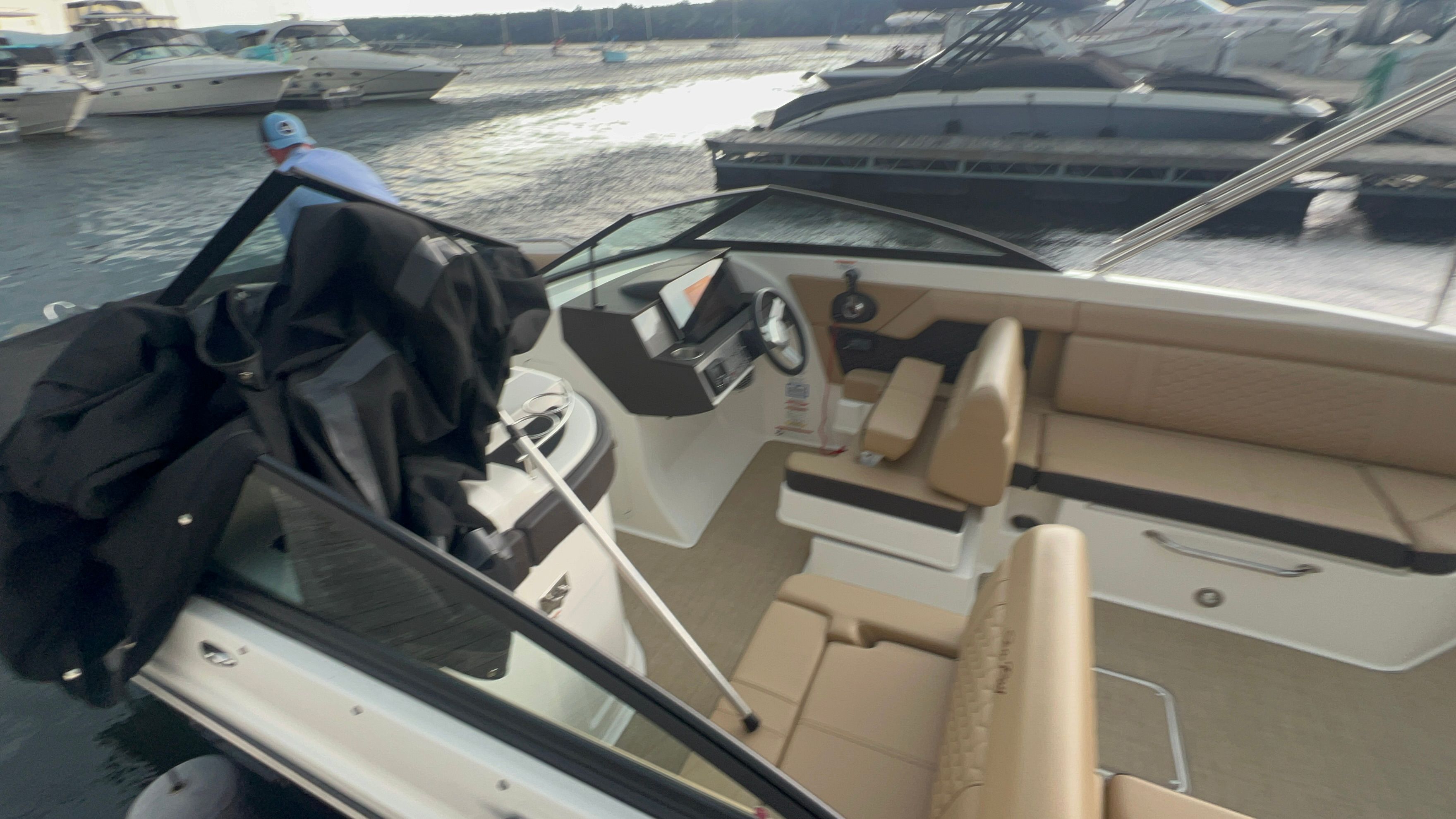 Interior view of a 2018 Sea Ray SDX 270 boat at the dock.