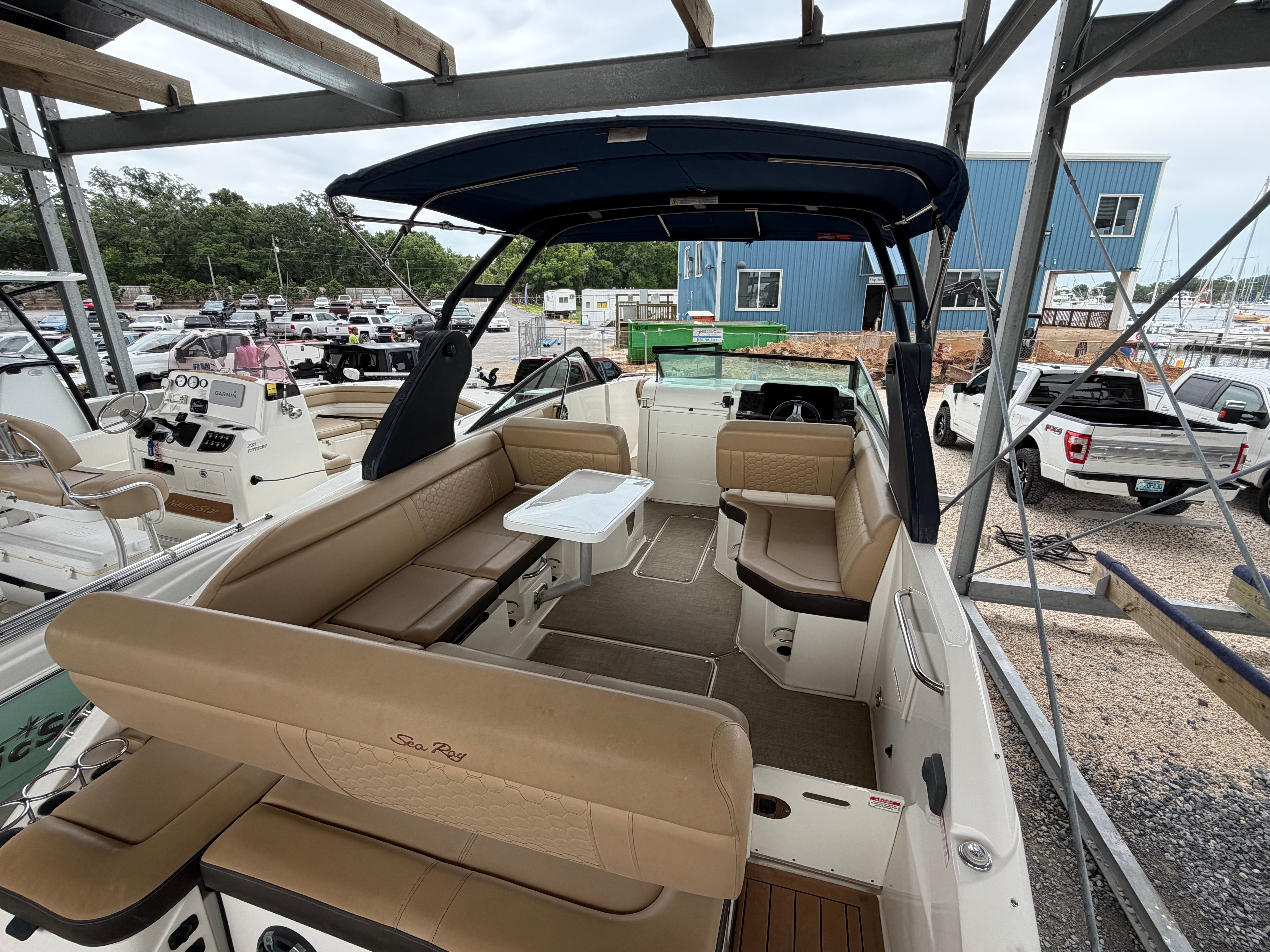 Interior view of a 2020 Sea Ray SDX 250 Outboard boat at the marina.