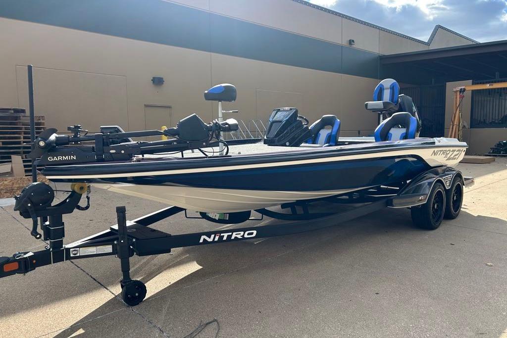2026 Nitro Z21 XL Pro fishing boat with Garmin equipment, parked outdoors.