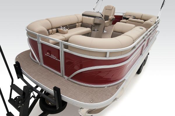 2024 Sun Tracker Party Barge 20 DLX pontoon boat with beige seating and red exterior.