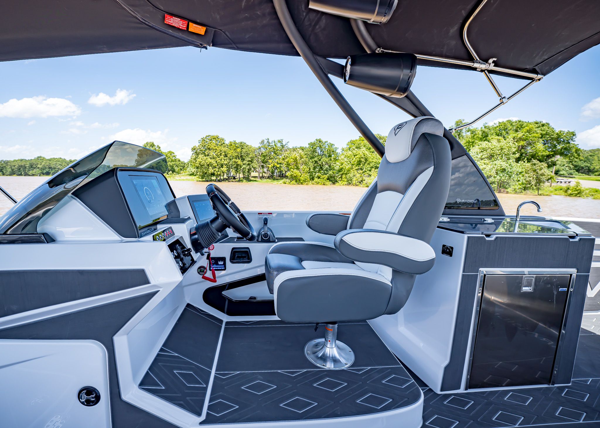 Interior of Paradigm 266 SL SURF boat, modern cockpit design, year 2025.
