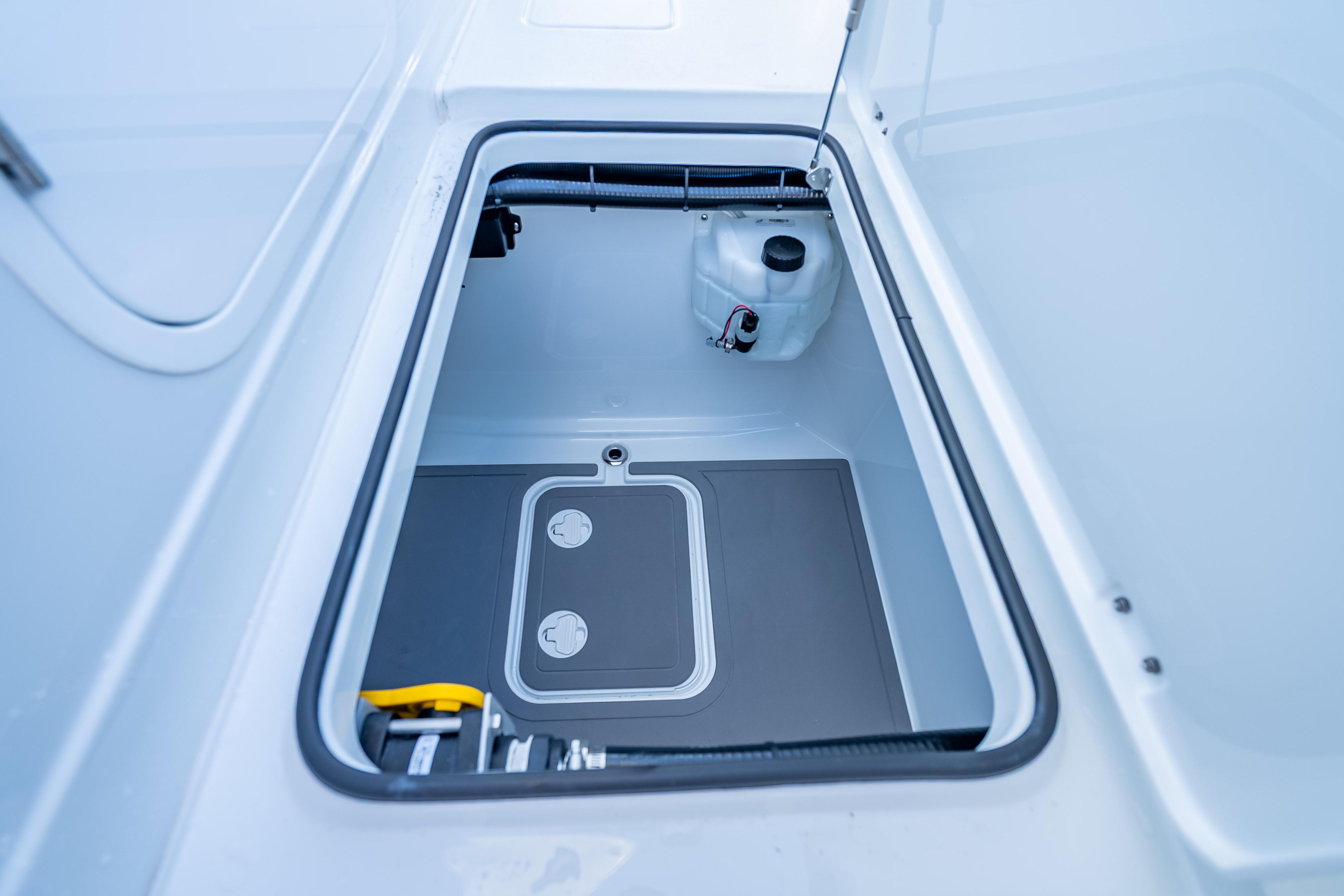 Storage compartment of 2026 Freeman 35 boat, featuring a clean, organized interior.