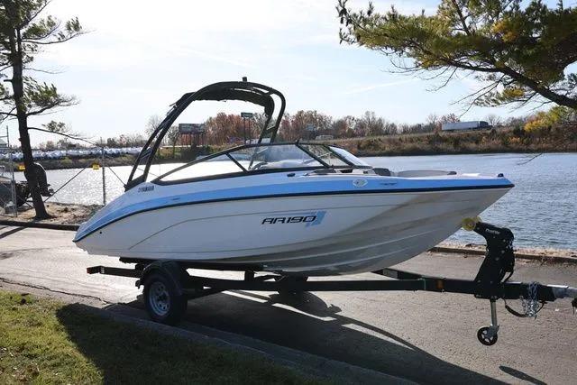 2026 Yamaha Boats AR190 on trailer by a scenic lakeside.