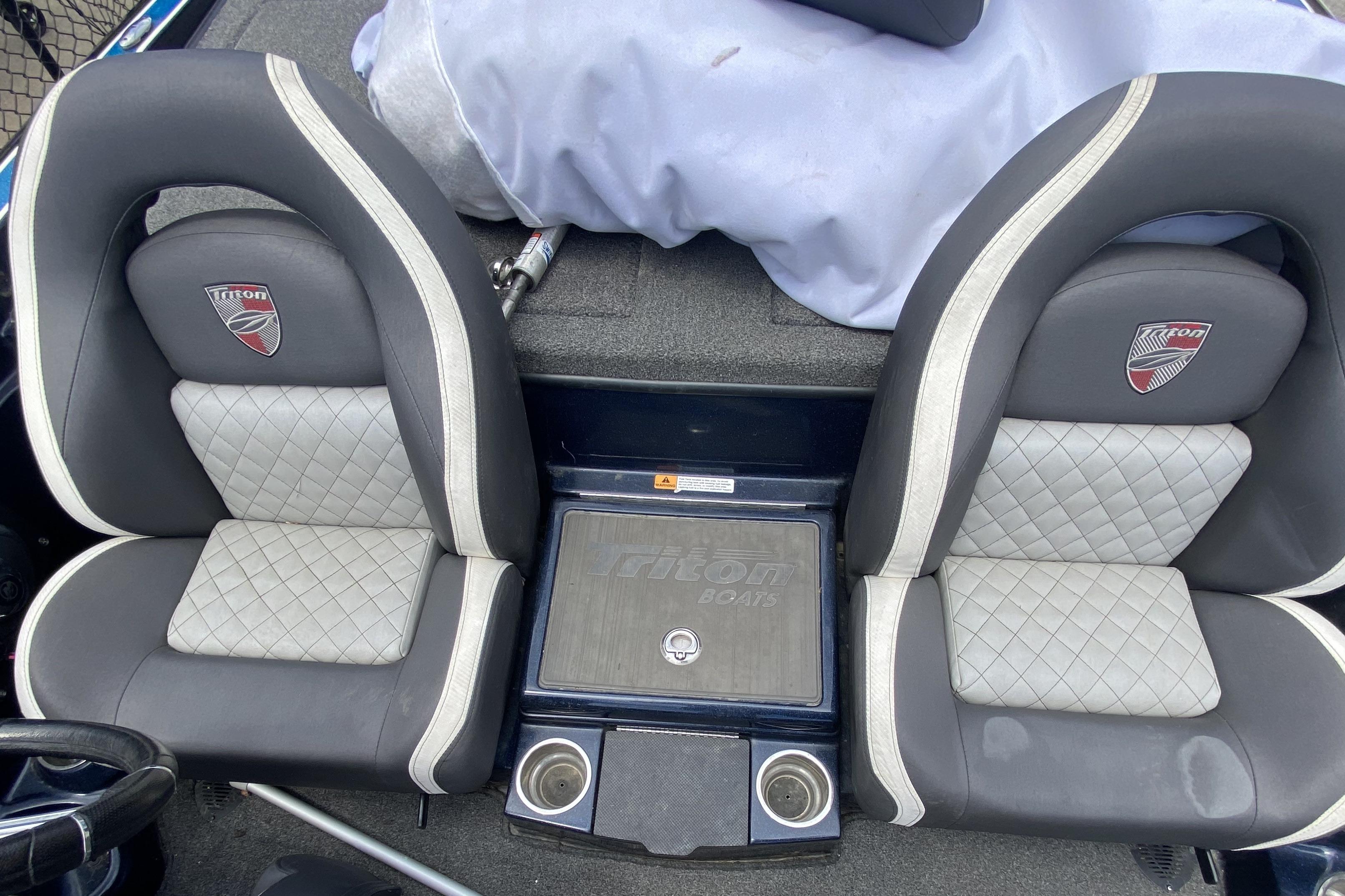 2020 Triton 20 TrX Patriot boat seats with quilted design and Triton logo.