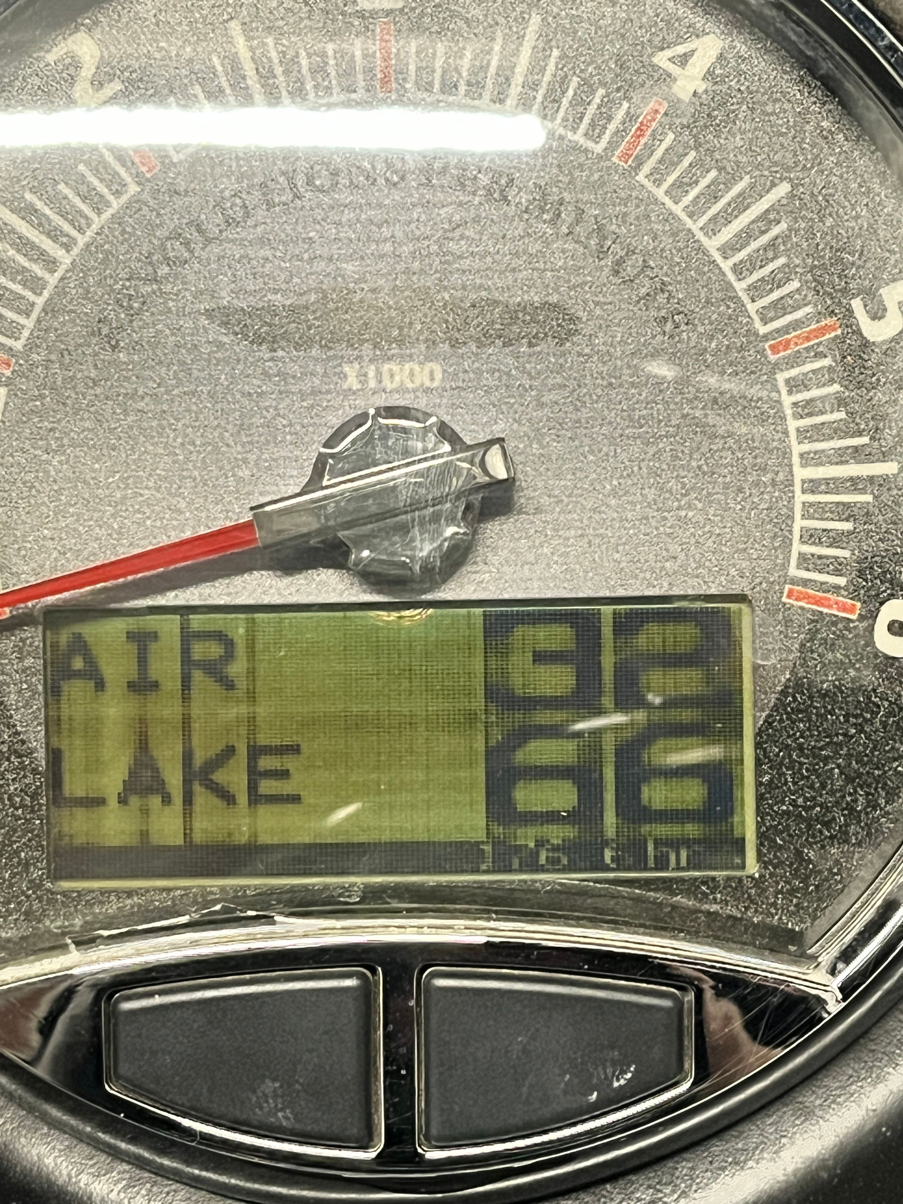 Axis A22 2013 tachometer with temperature display.