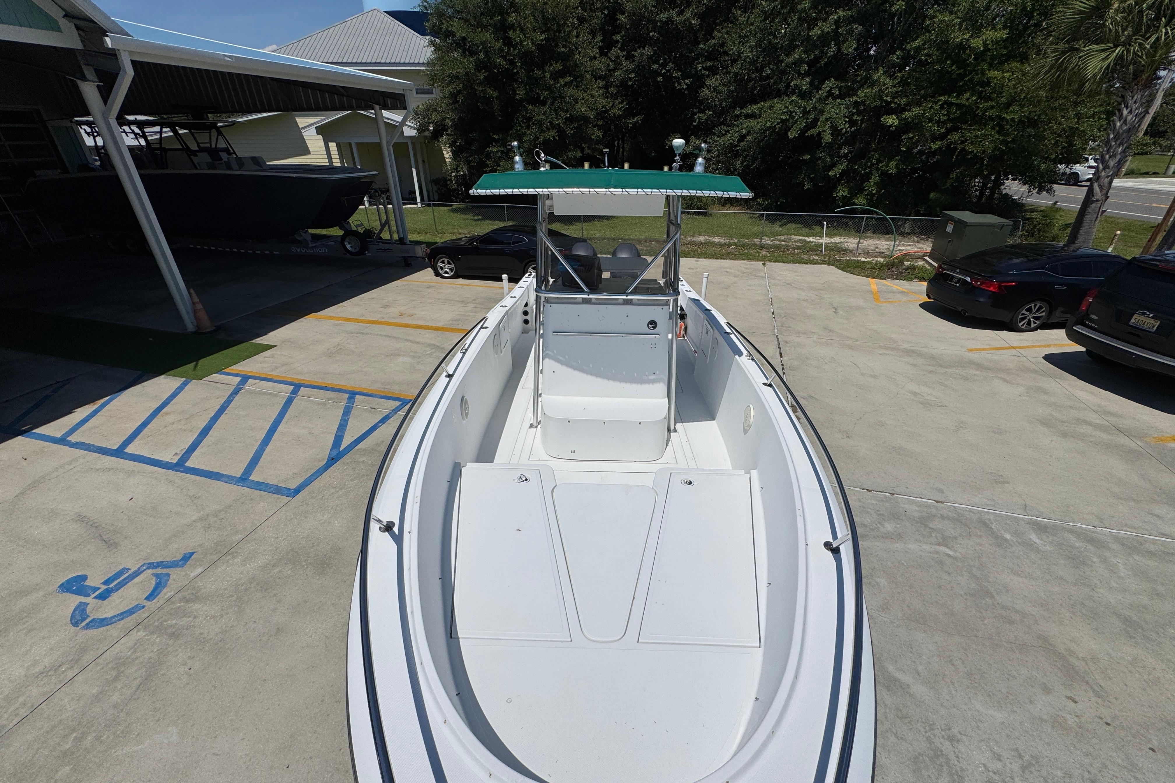 2000 Stamas 250 Tarpon boat in parking lot, viewed from above.