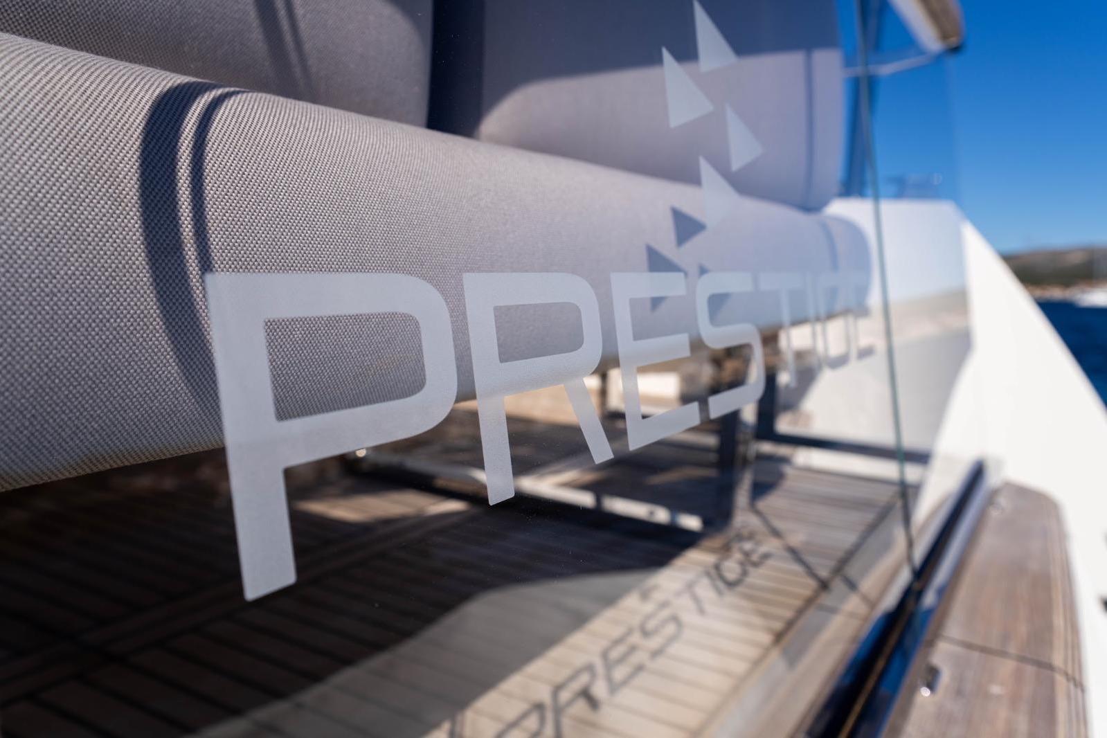 2023 Prestige X60 yacht with sleek design and modern glass detailing.
