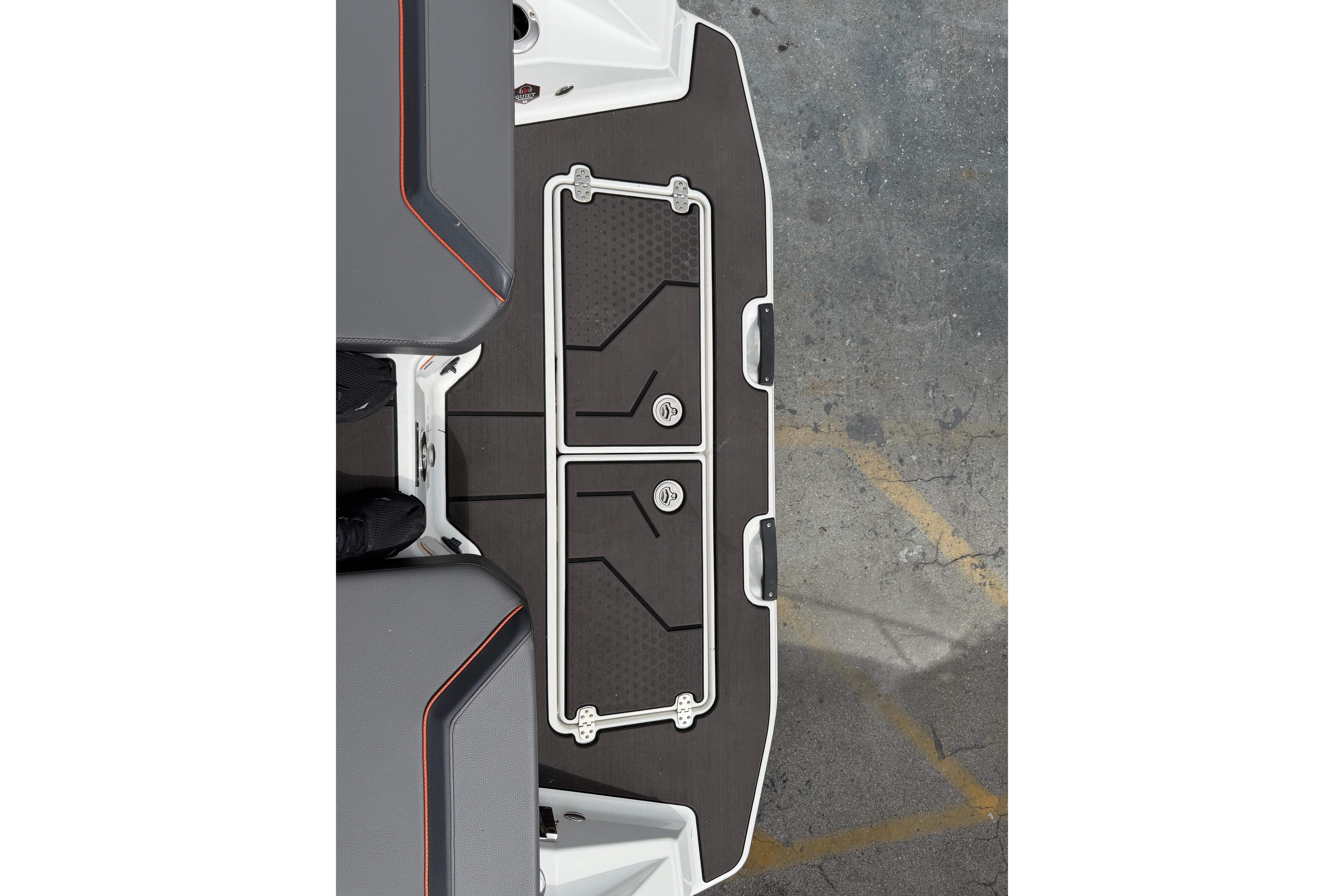 2026 Scarab 235 LX boat deck with sleek design and storage compartments.