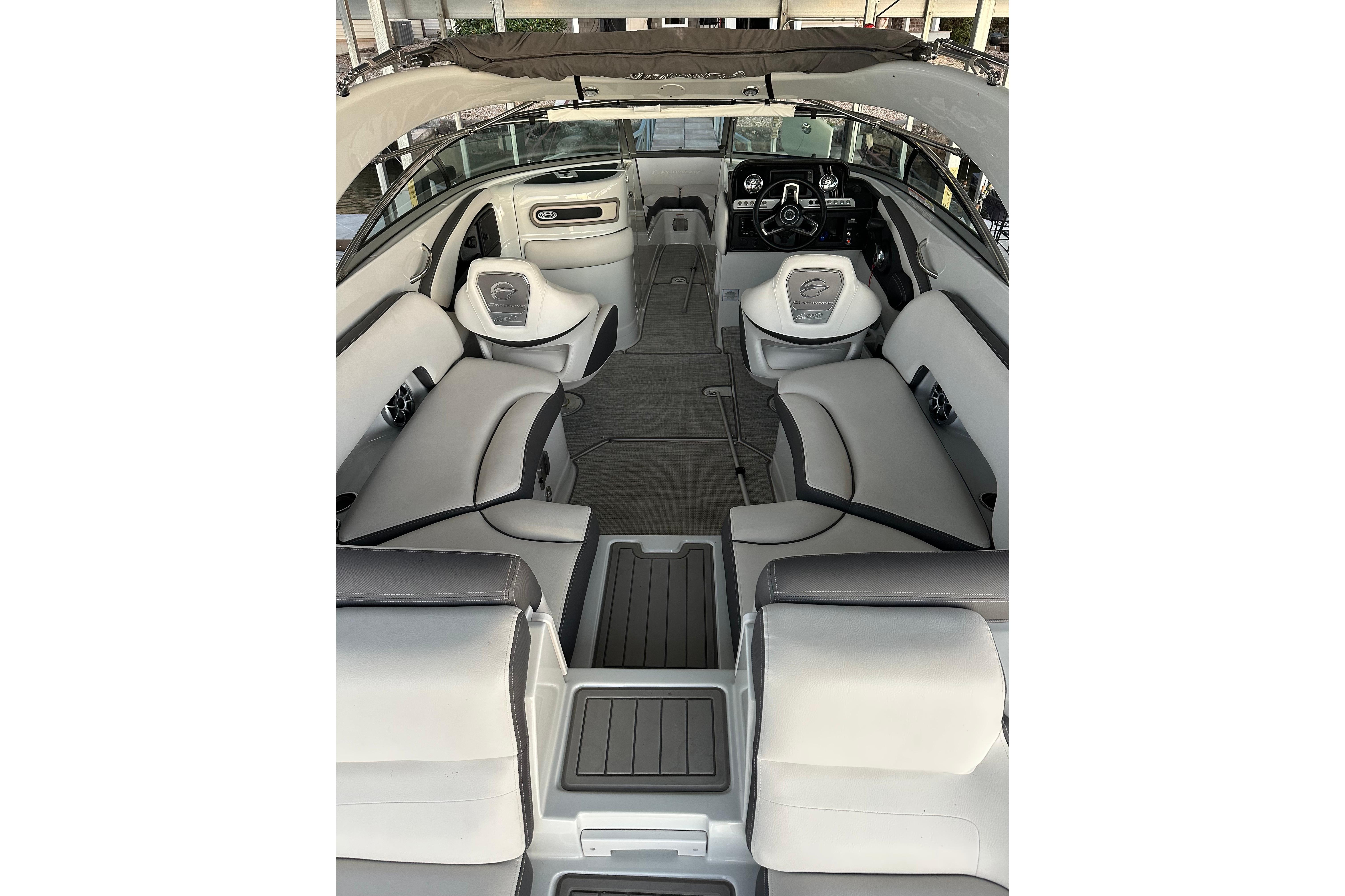 2022 Crownline 265 SS boat interior with luxurious seating and modern dashboard design.