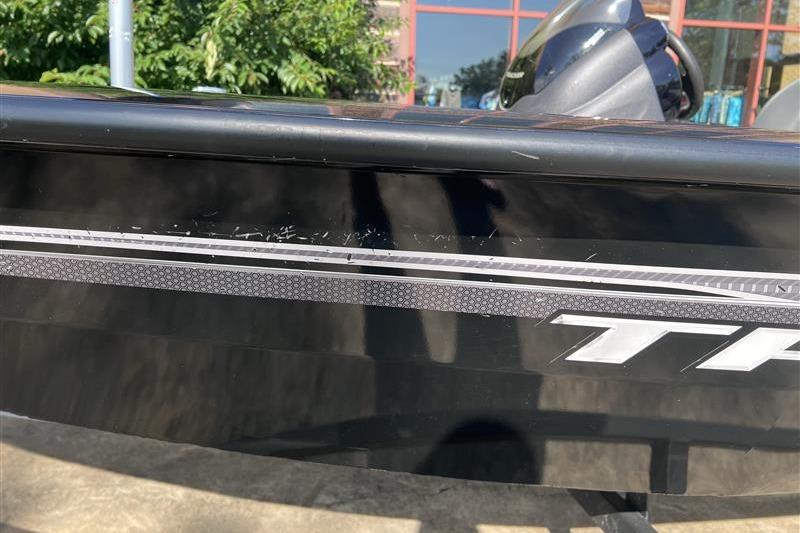2021 Tracker Pro Team 175 TXW boat with visible scratches on the side.