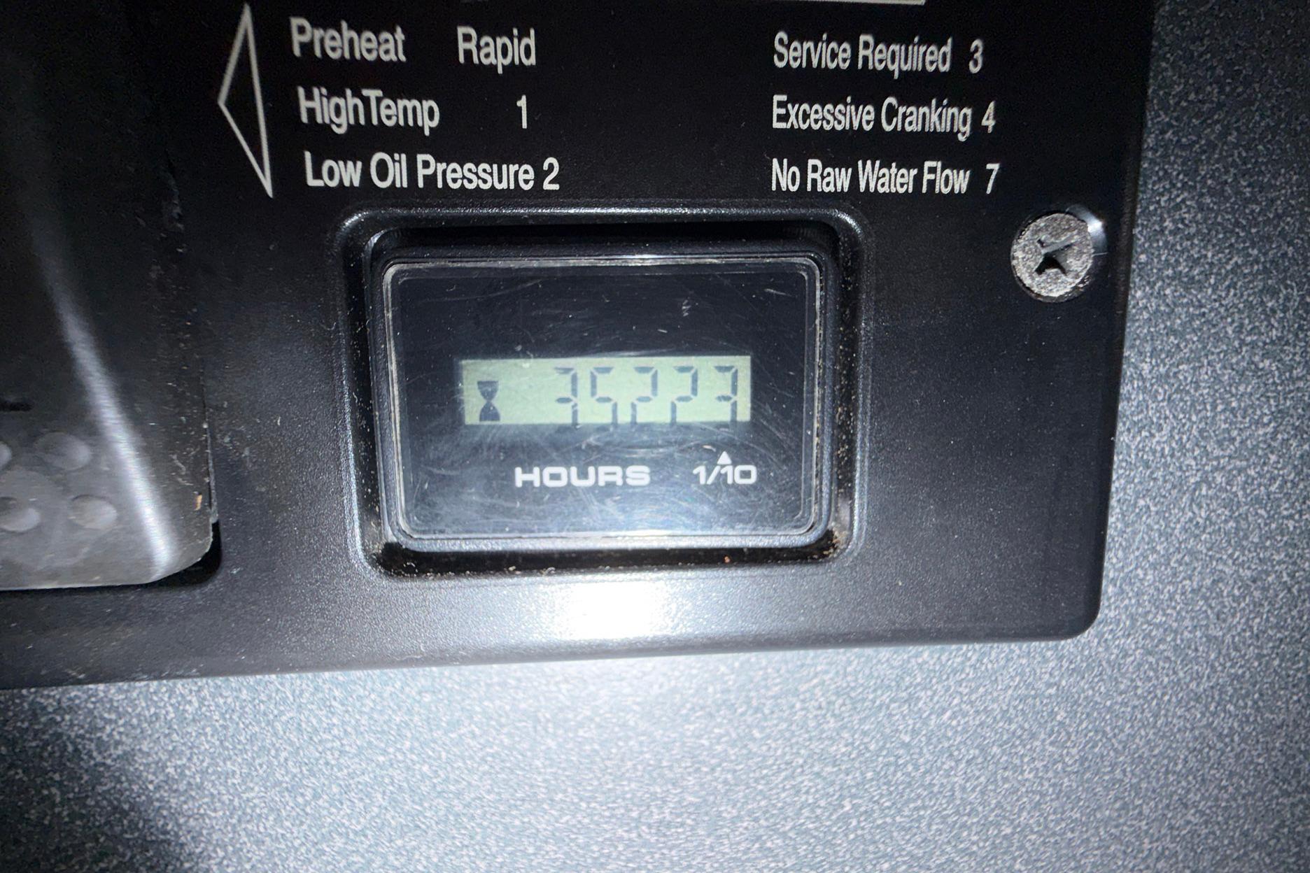 Hour meter display on 2004 Beneteau 57 sailboat, showing 3523 hours.
