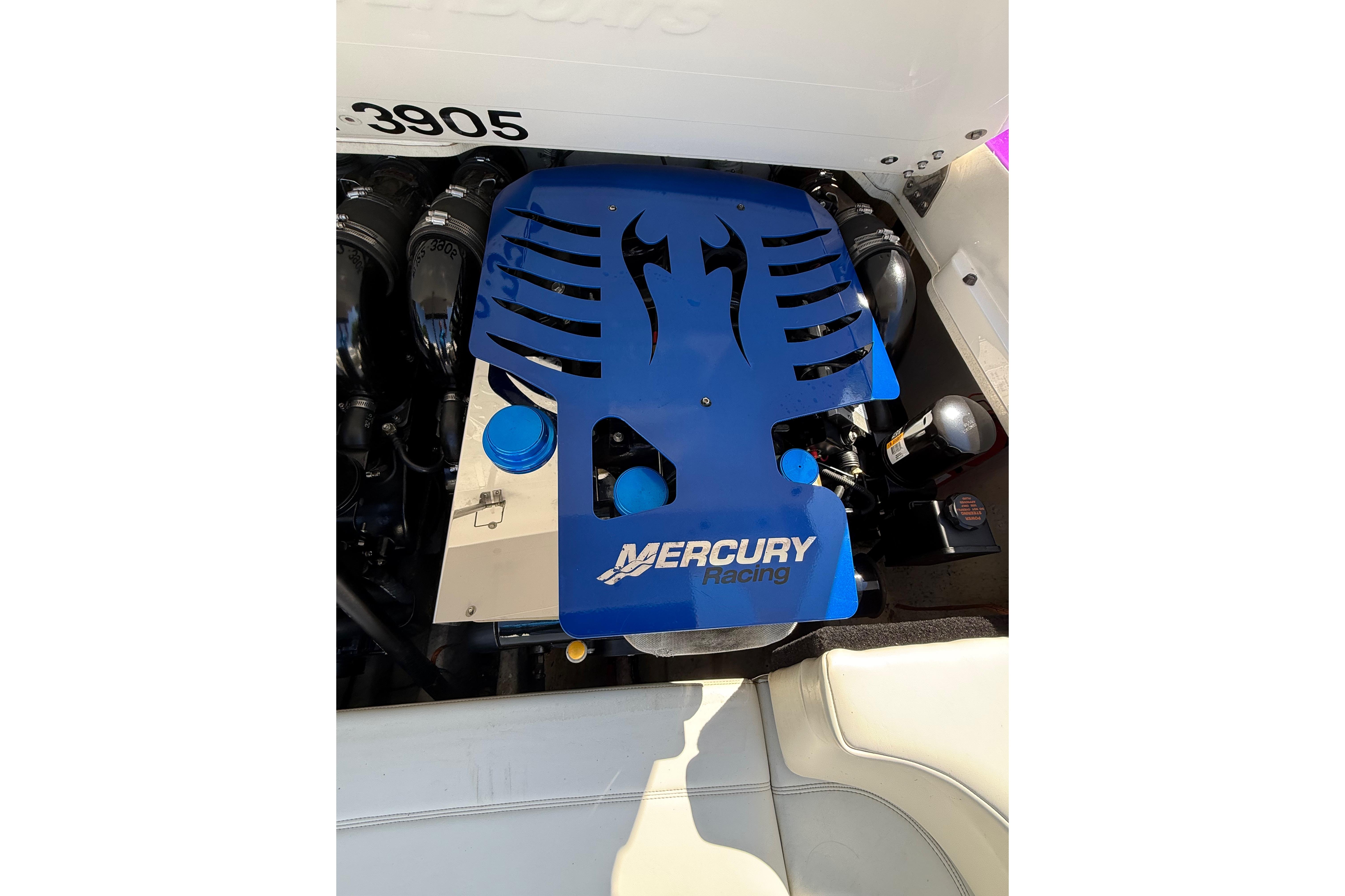2005 Sunsation 32 Dominator engine with blue Mercury Racing cover.