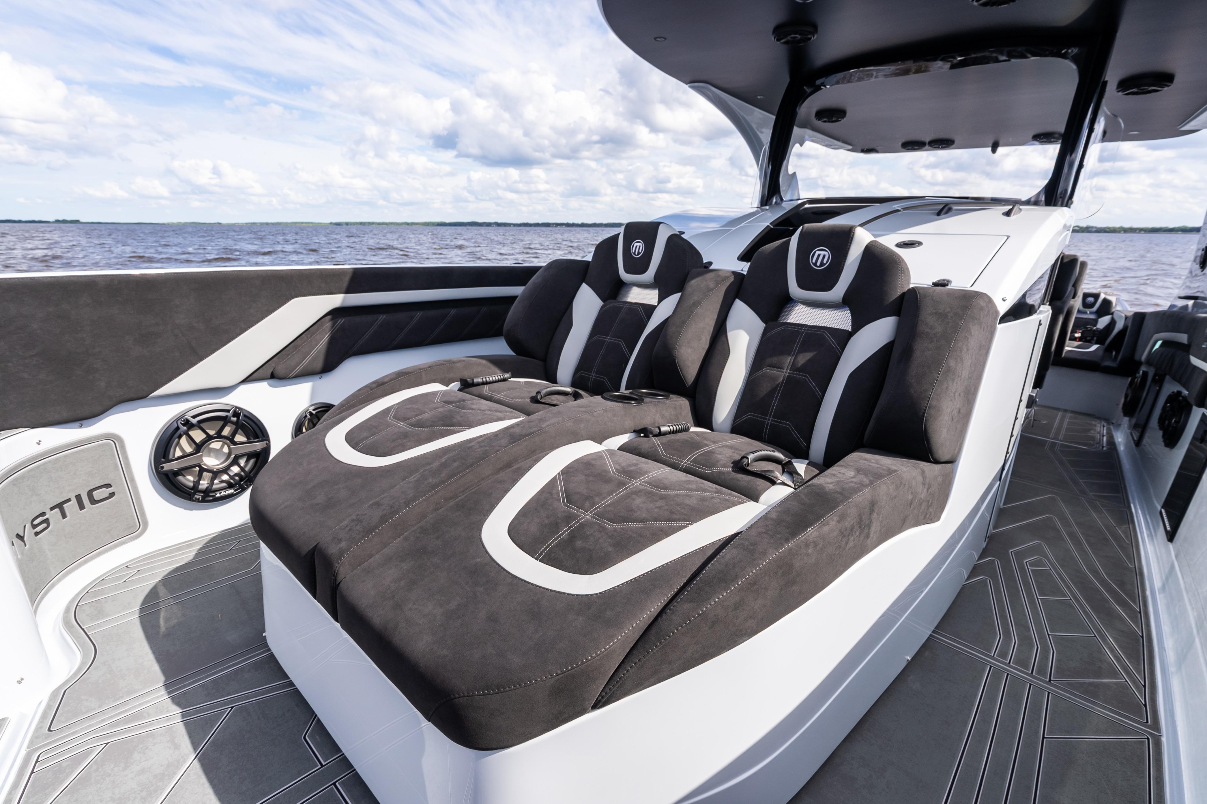 Luxurious interior of 2027 Mystic Powerboats M4200, featuring plush seating and modern design.