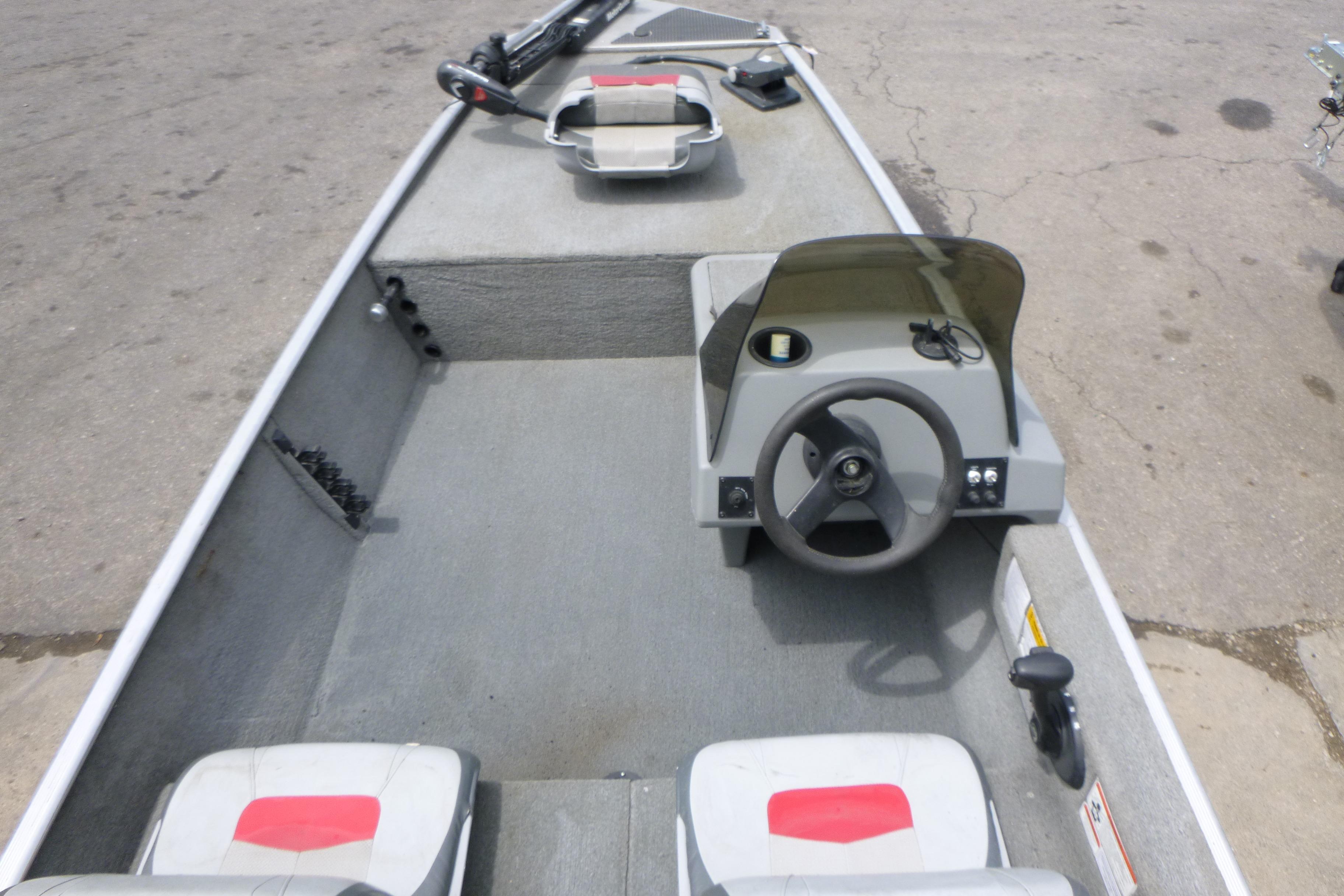 2011 Tracker Pro Angler 16 boat interior with steering console and seating.