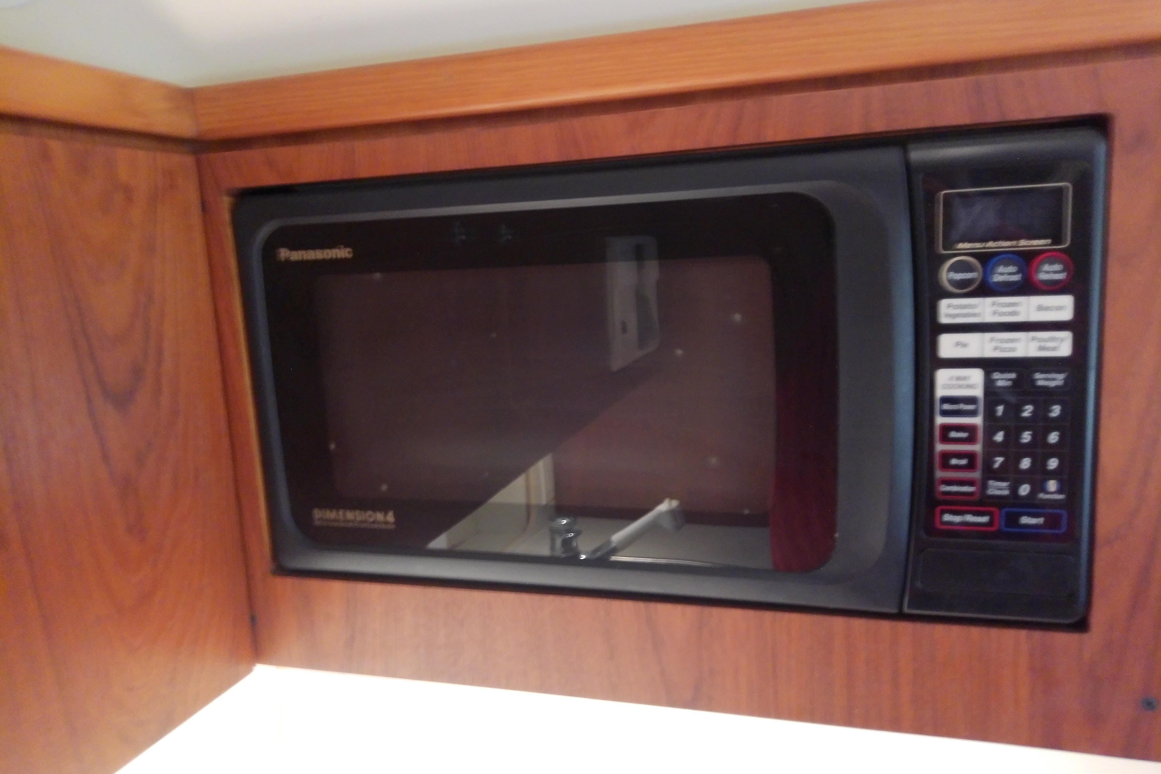 Built-in Panasonic microwave in 2000 Tiara Yachts 4100 Open kitchen.