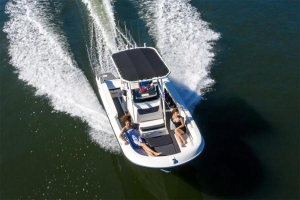 Manufacturer Provided Image: 2025 Bayliner Trophy T22CC boat cruising with passengers on open water.