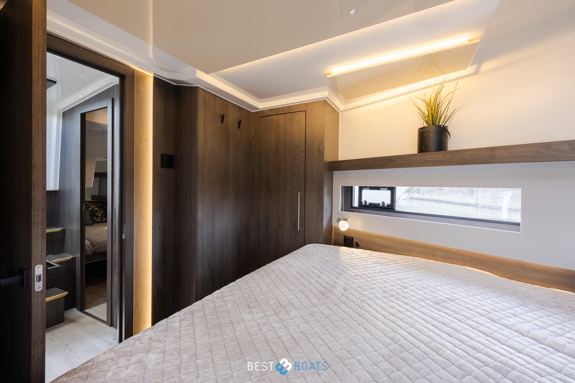 Luxurious bedroom interior of 2023 Cobra Yachts Futura 36 Premium Fly, featuring modern design elements.