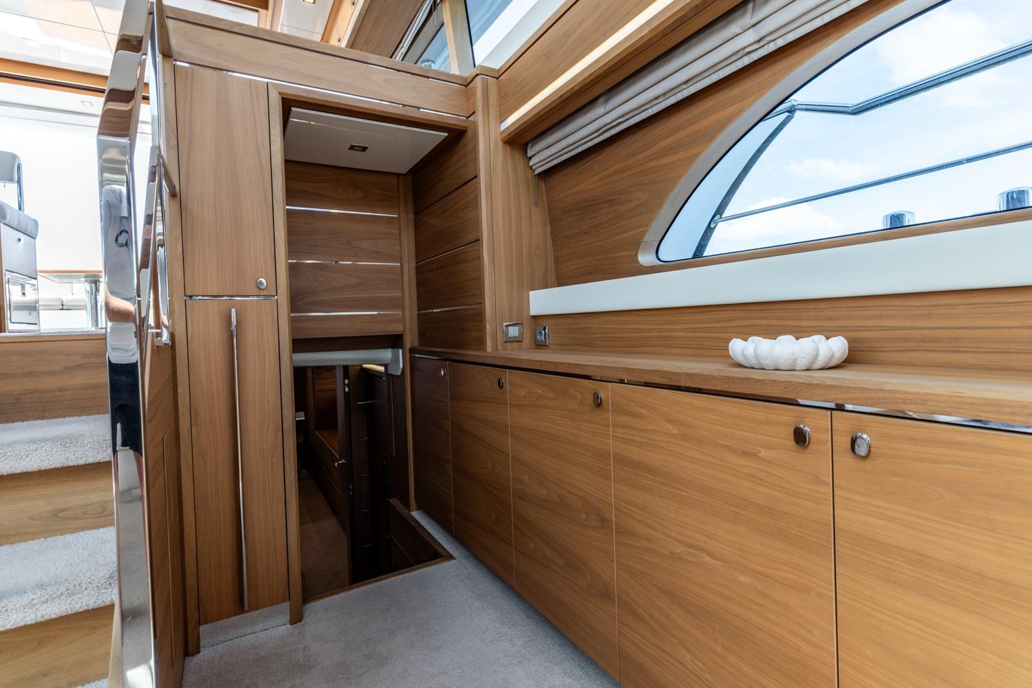 Luxurious interior of 2013 Valk Continental 2000 Aluminium yacht with wooden cabinetry and modern design.