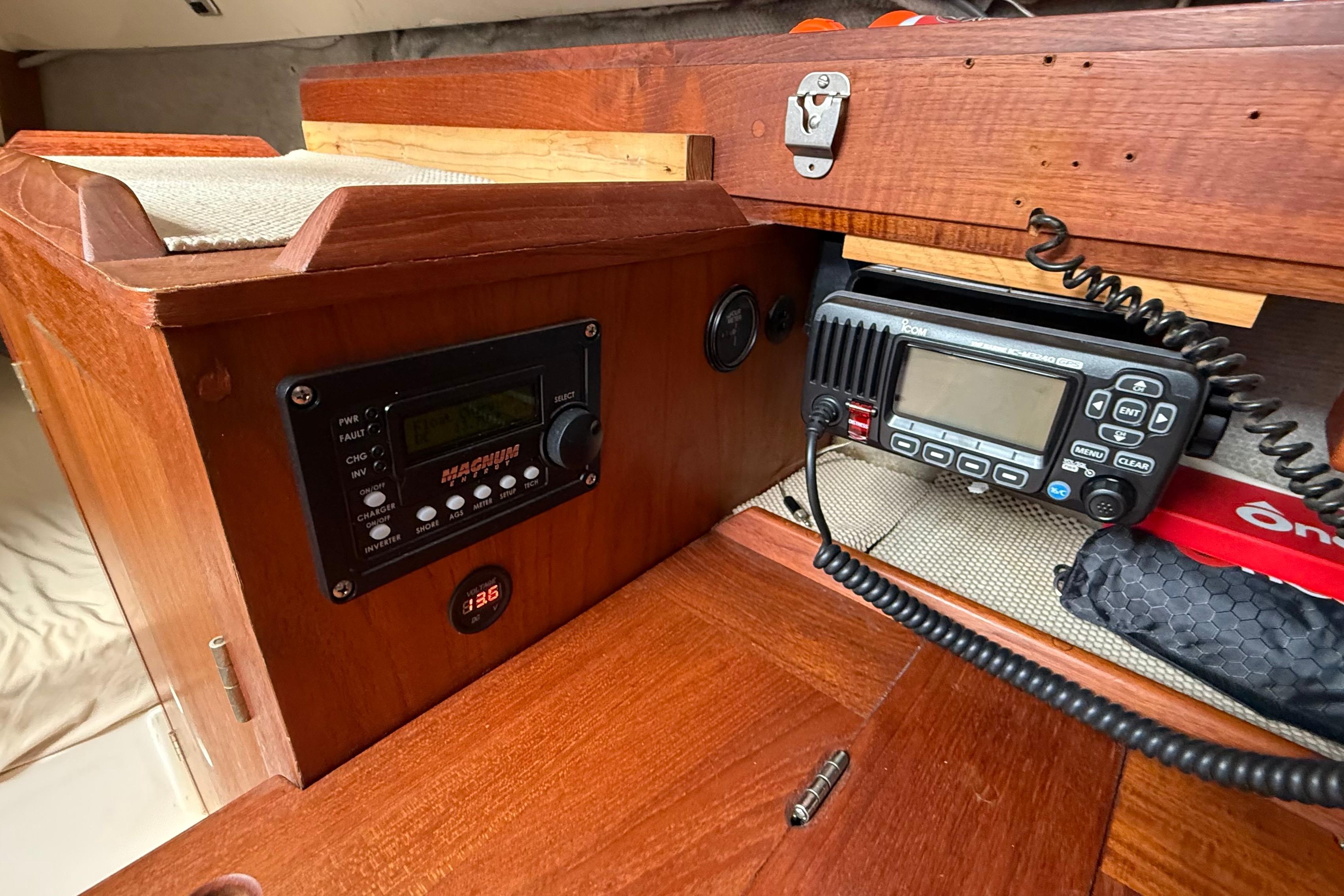 Interior of 1984 Hunter 31 sailboat with radio and control panel.