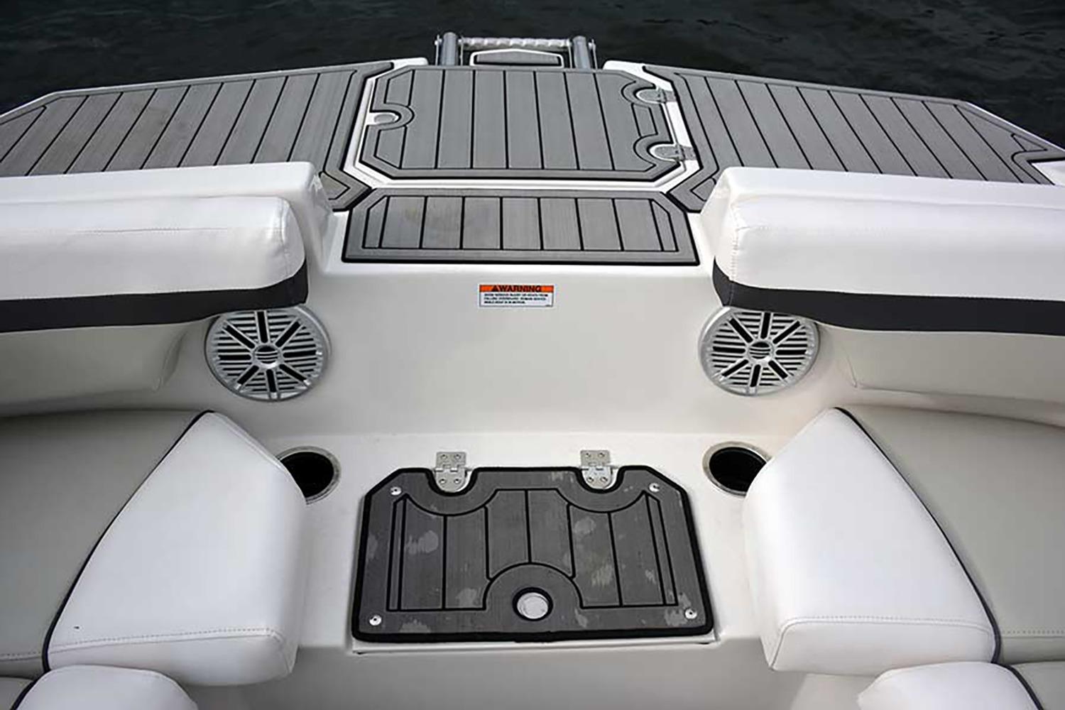 Manufacturer Provided Image: 2026 Starcraft SVX 211 OB boat interior with cushioned seating and integrated speakers.