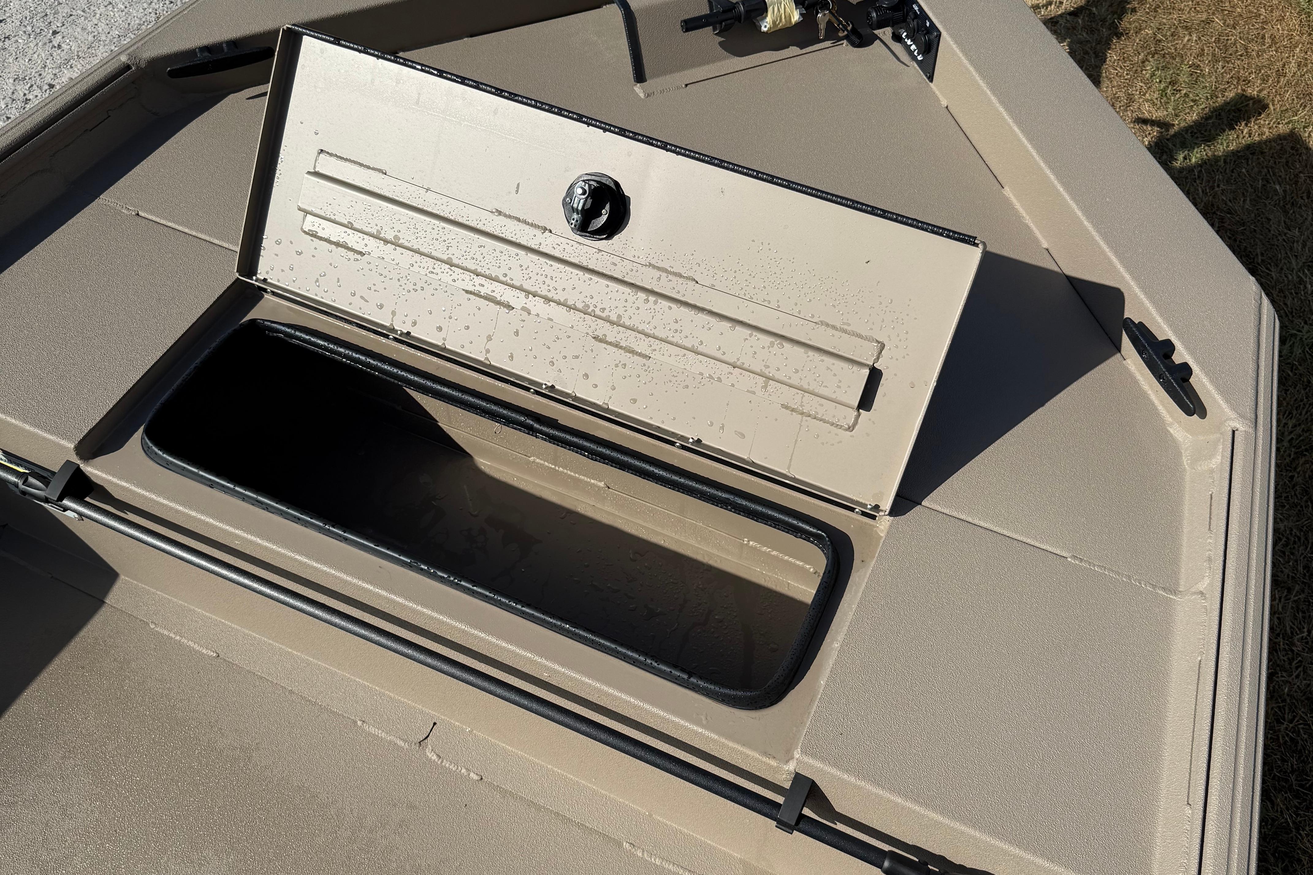 2025 Alweld 1756 V MARSH C.C. boat storage compartment, open lid, beige color.